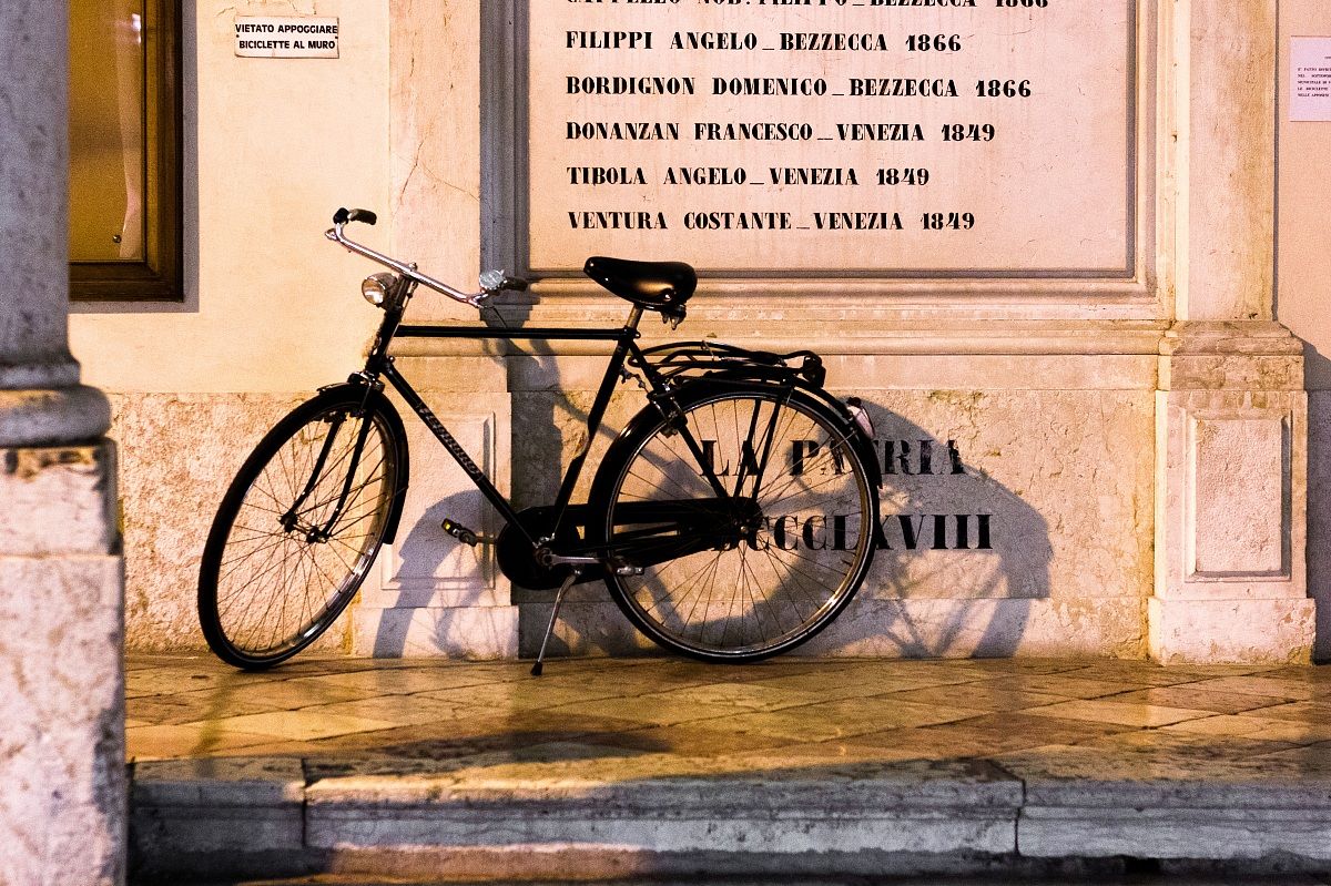 No rest them on bicycles on the wall