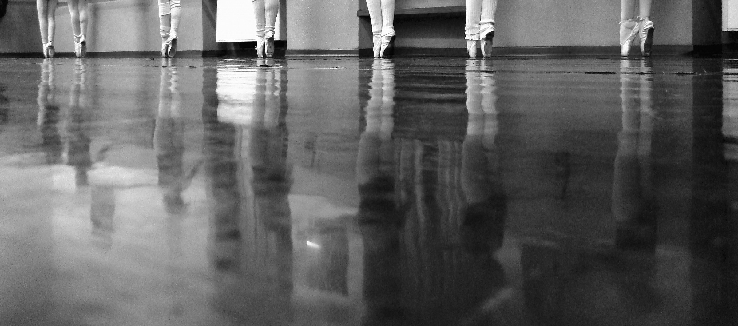 dancers in reflection