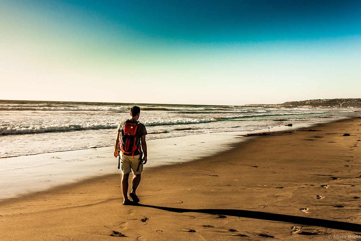 Backpacker over the ocean