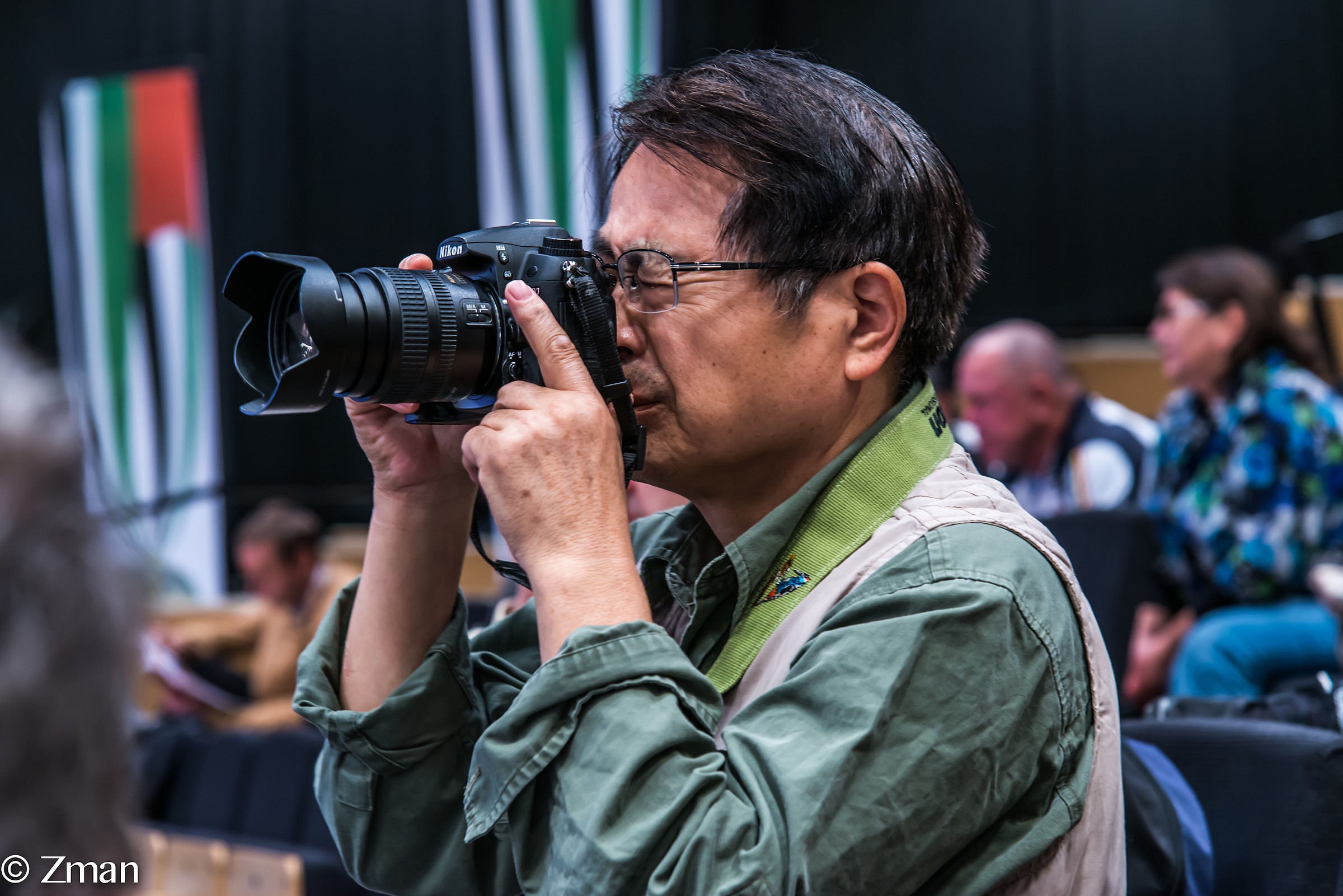 The Photographer at The Judo Championship