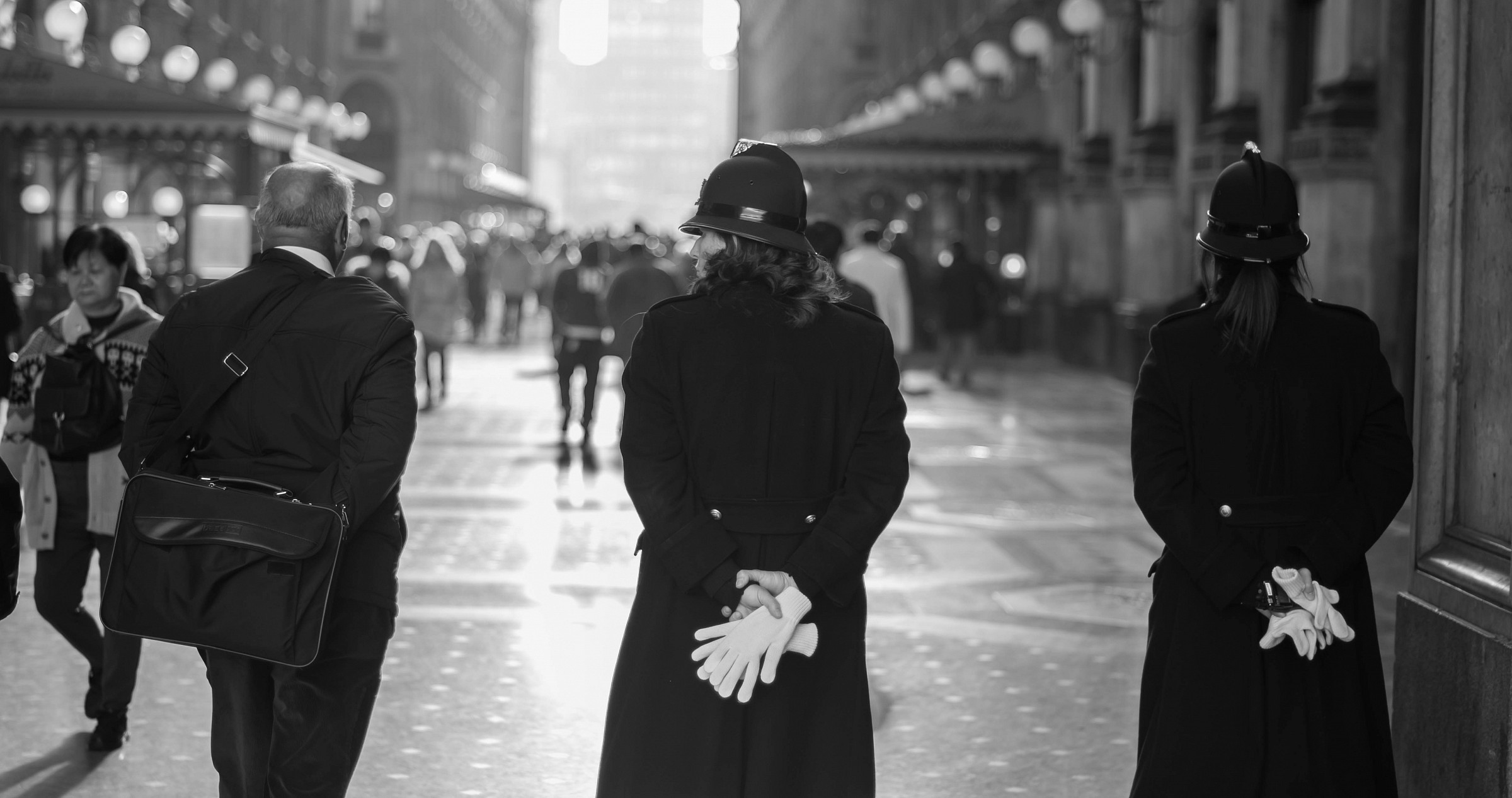 Hands behind his back