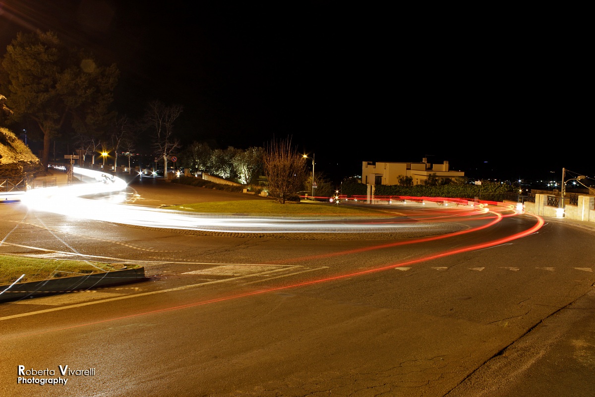 Trails of light along the walls of Tarquinia.