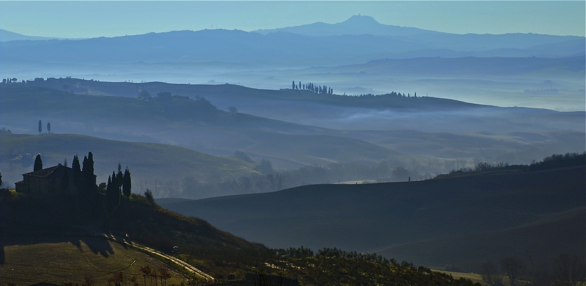 the morning mist in the hills of Siena