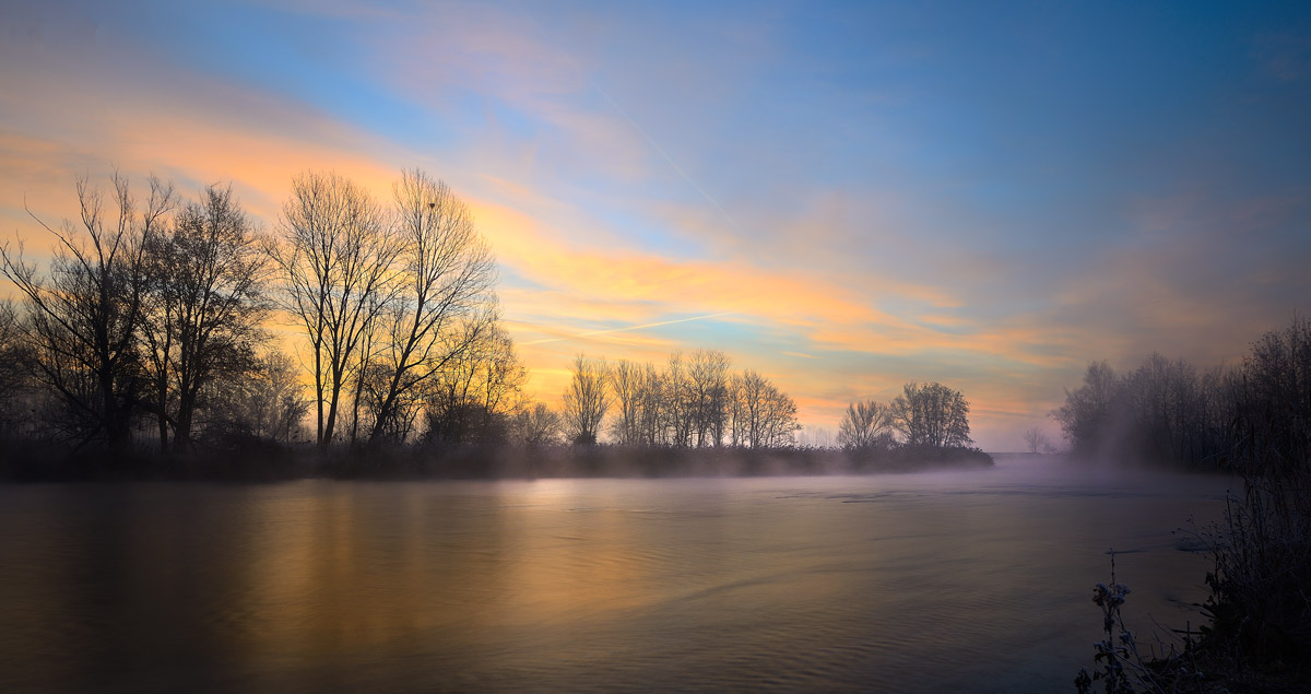 Sunrise on the river Mincio
