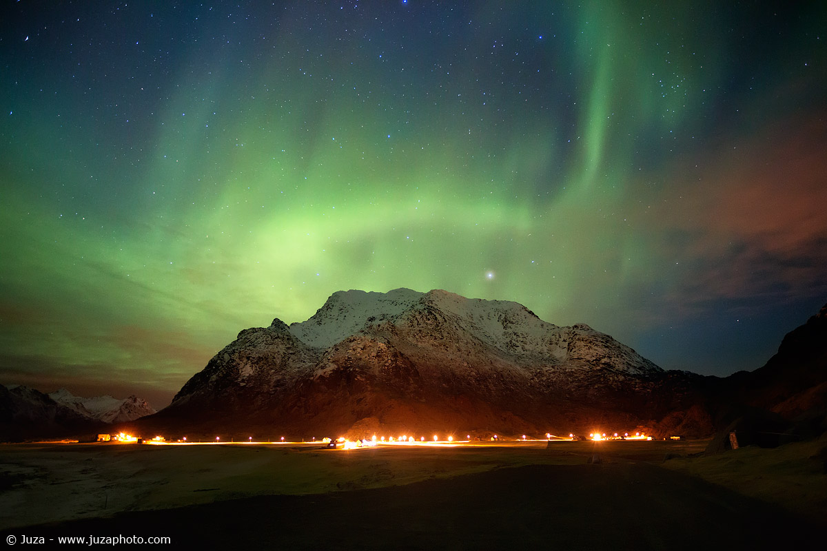 Aurora lights up the road