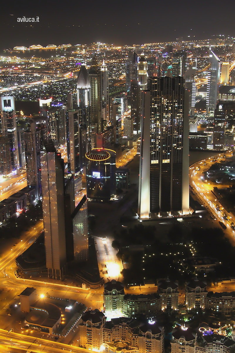 Burj Khalifa in Dubai by night from the 124th floor ...