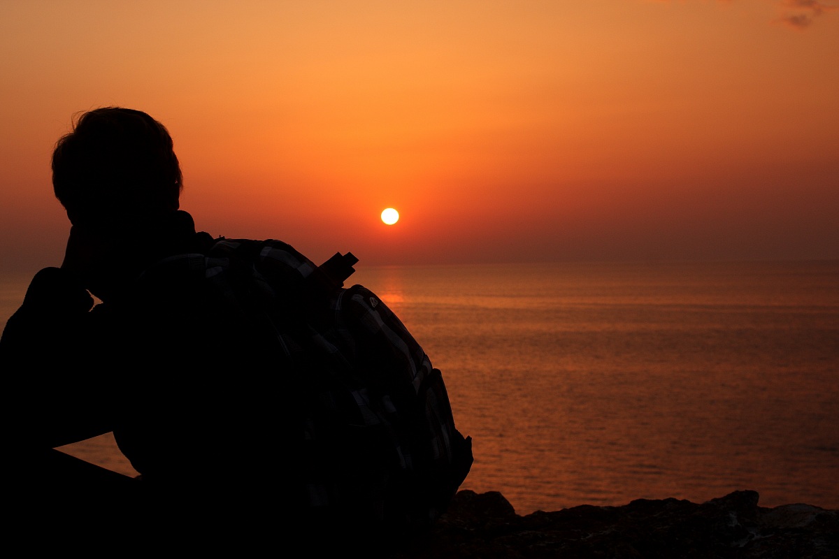 My wife looking at the sunset