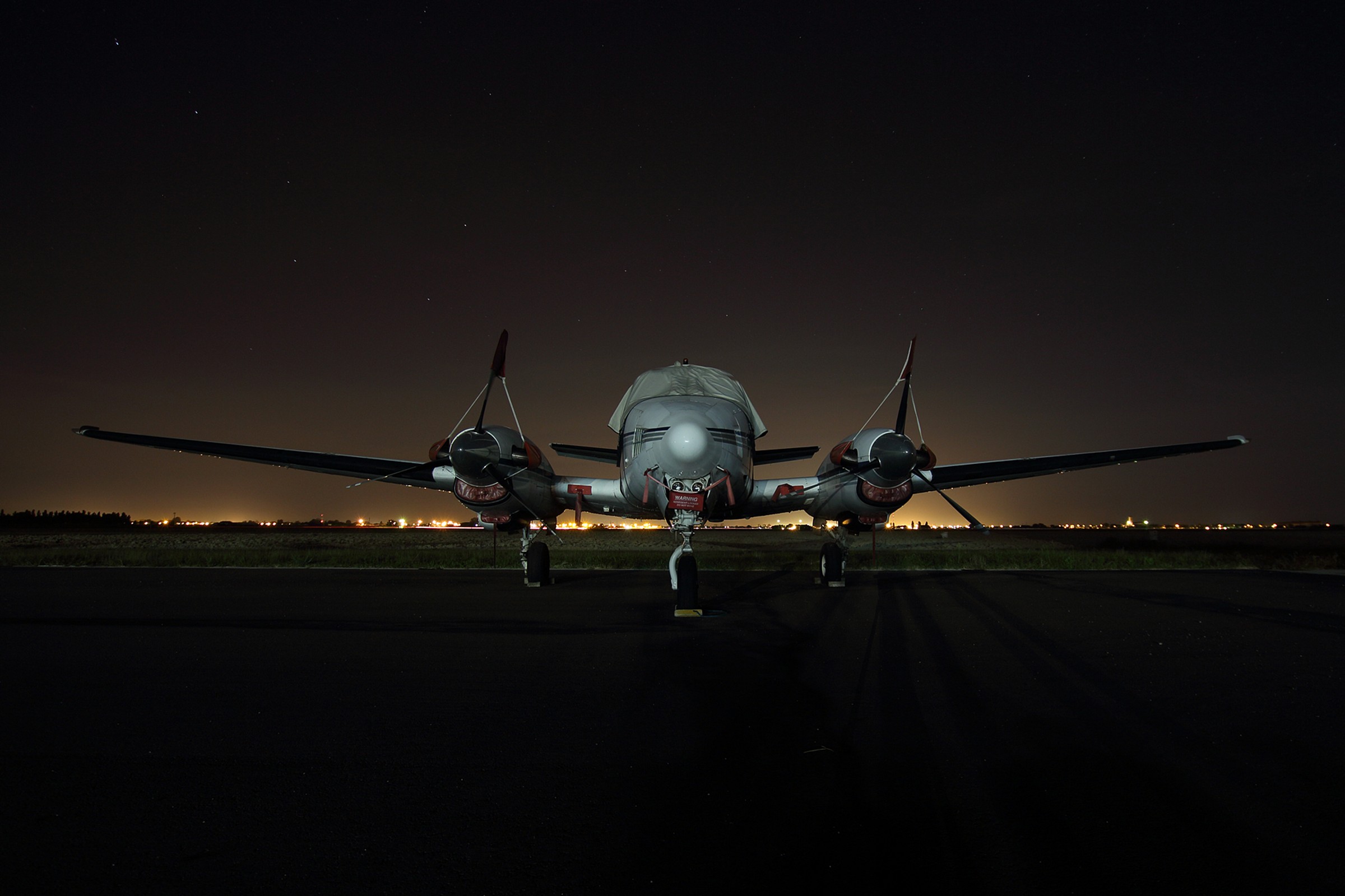 Plane sleeping under the big wagon