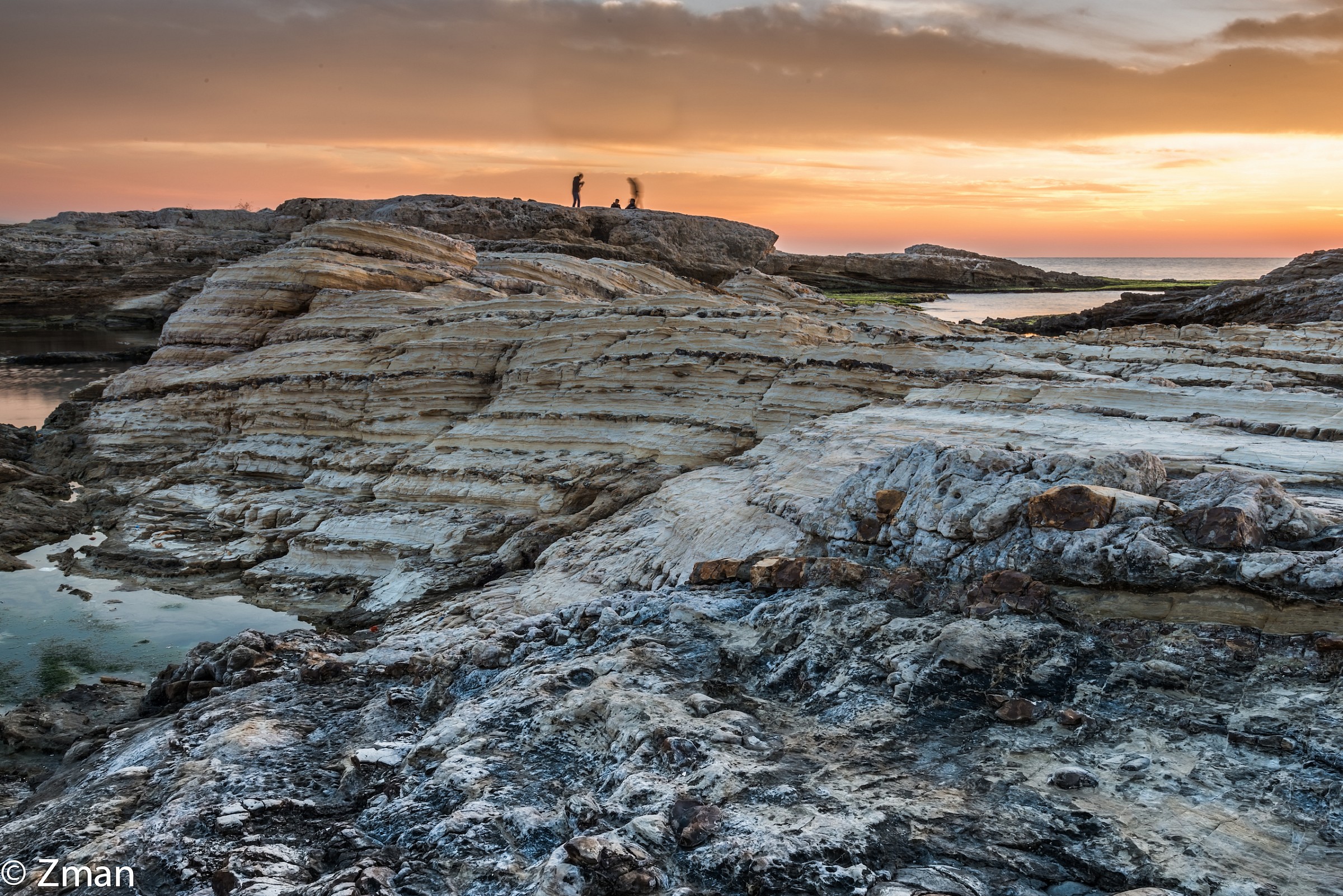People watching the Sunset near Alrawshe