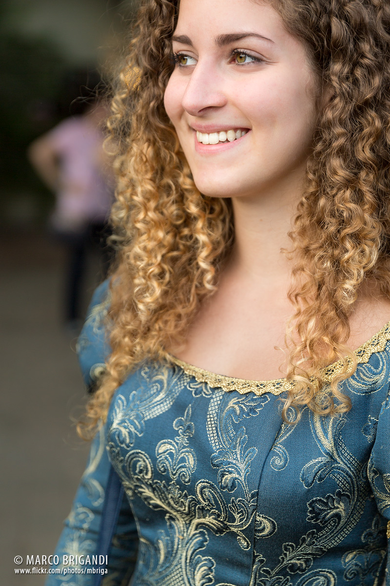 Beautiful girl in traditional dress-blue Bustofolk '13