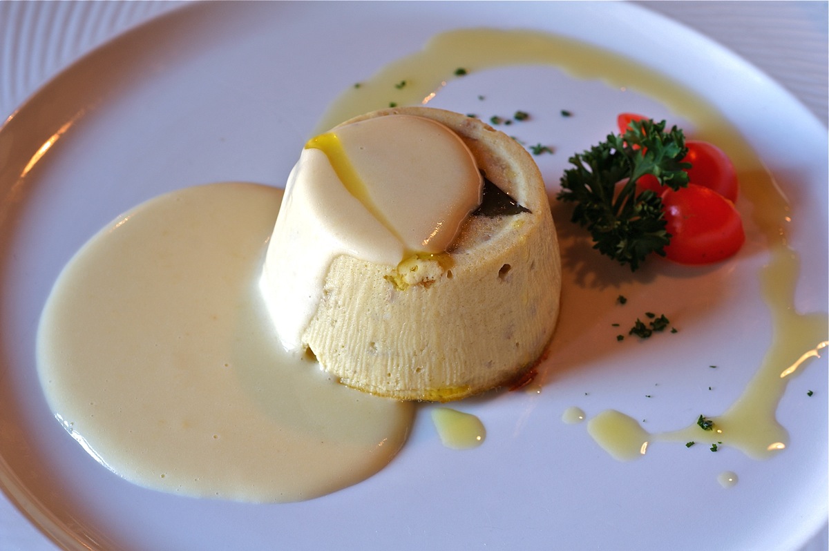 Eggplant flan and spelled with creamy parmesan