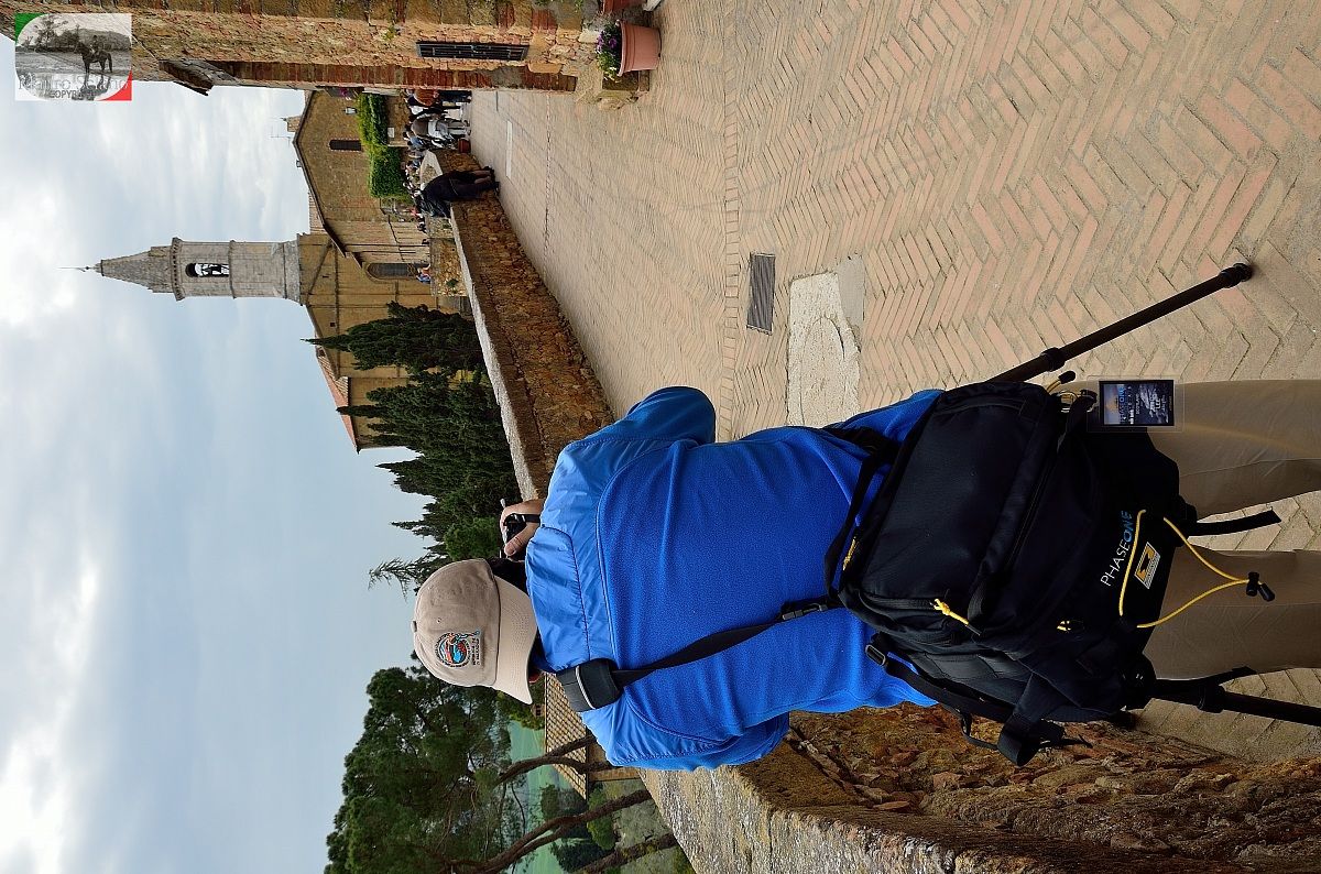 As a photographer you Pienza (read on his bag)