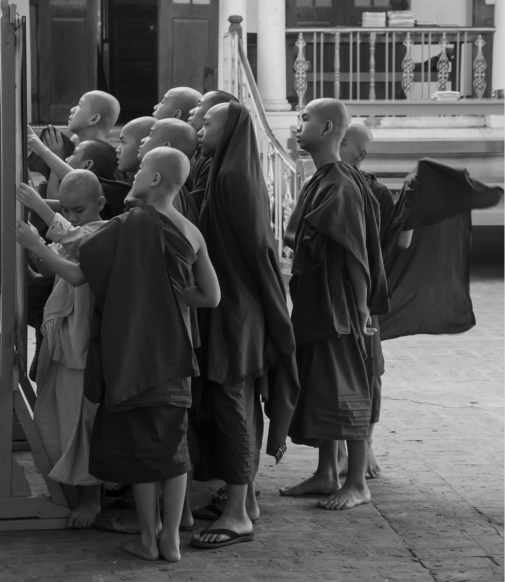 Burma. Monastery in Bagaya kyaung. Monks read ....