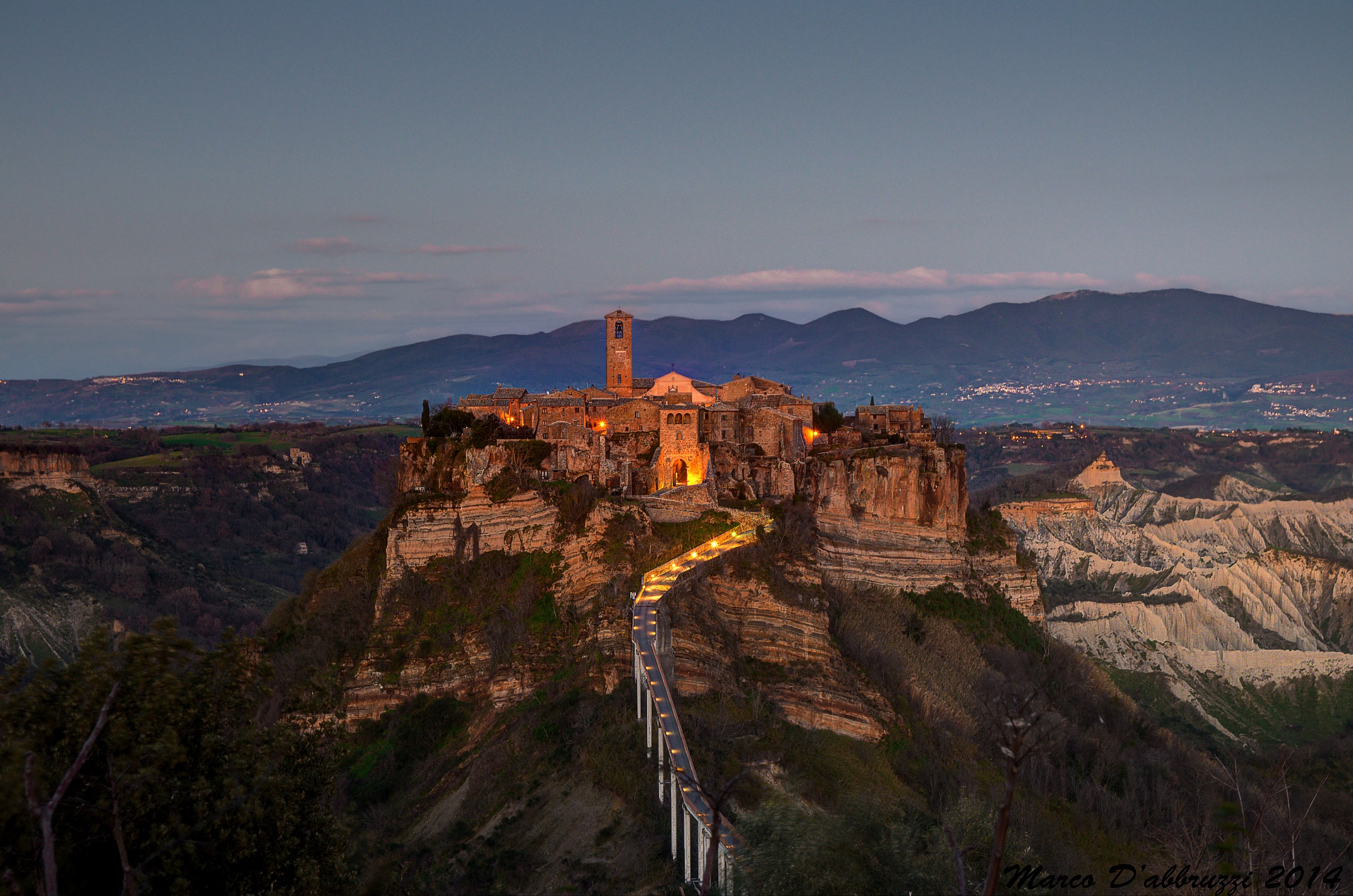 Bagnoregio and the first lights of evening