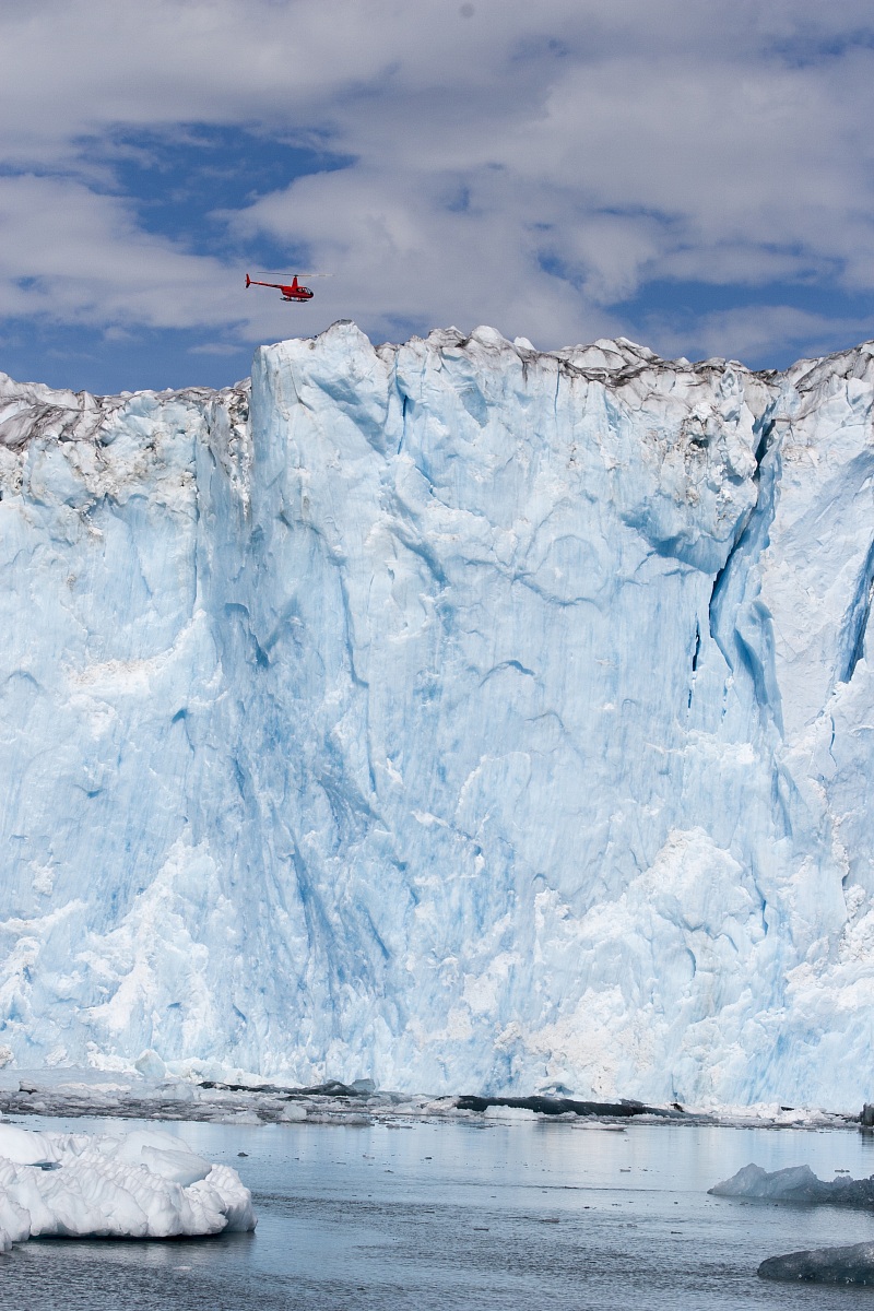 Helicopter flying over Columbia Glacier