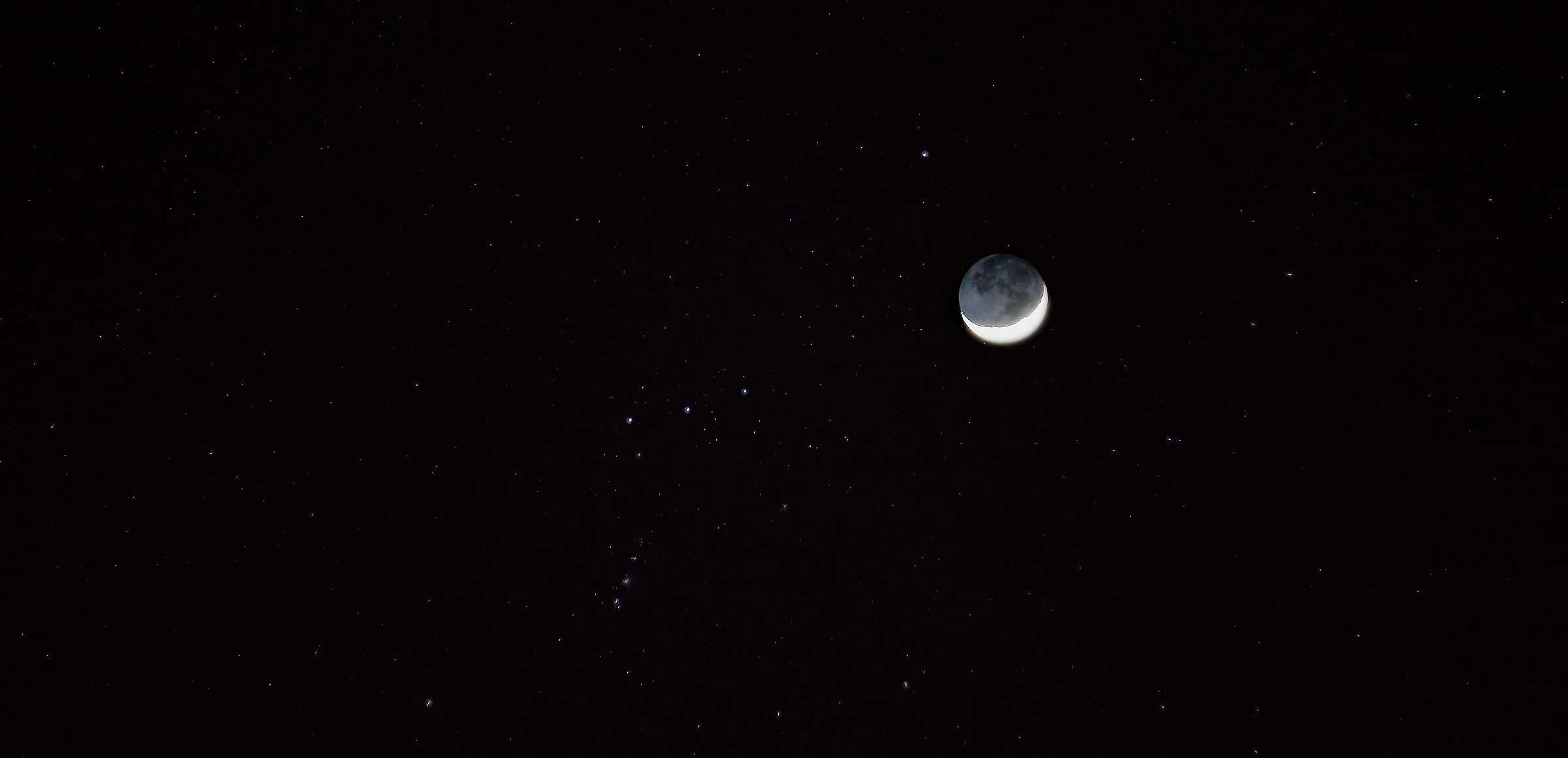 new moon and starry skies