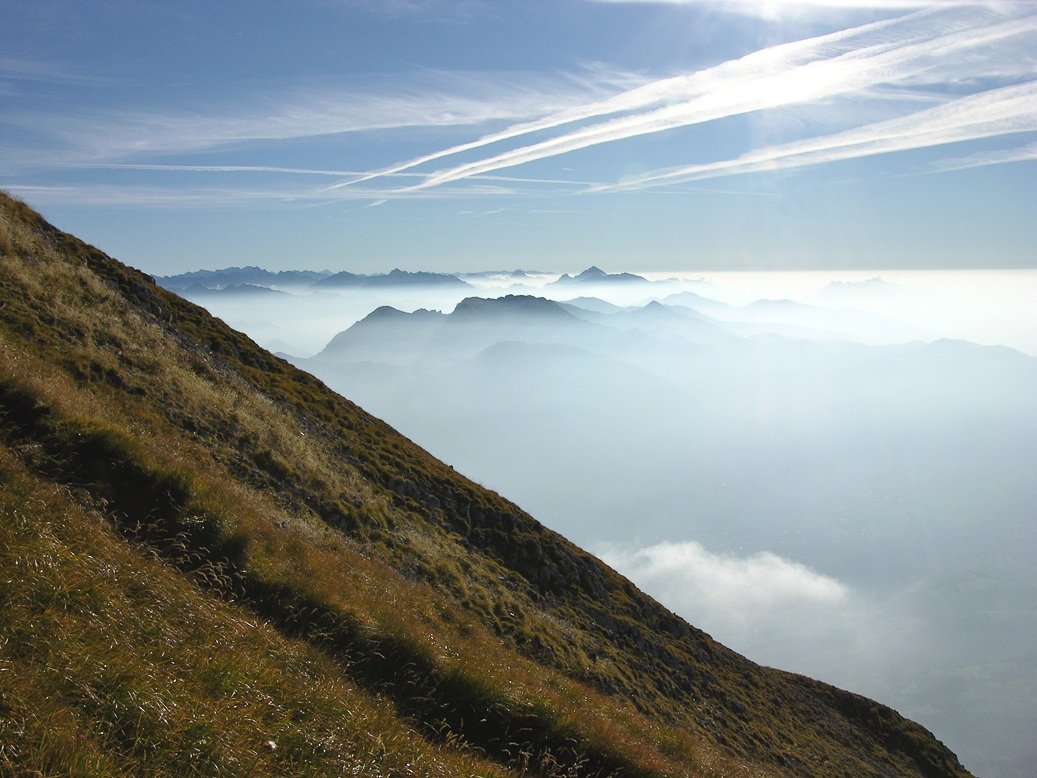 Peaks in the Alpine foothills in the clouds