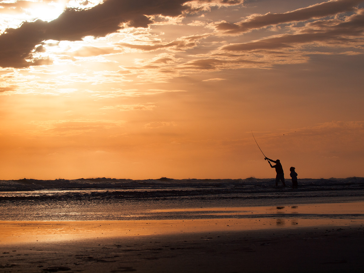 Father and son fishing in Monte Hermoso (arg).