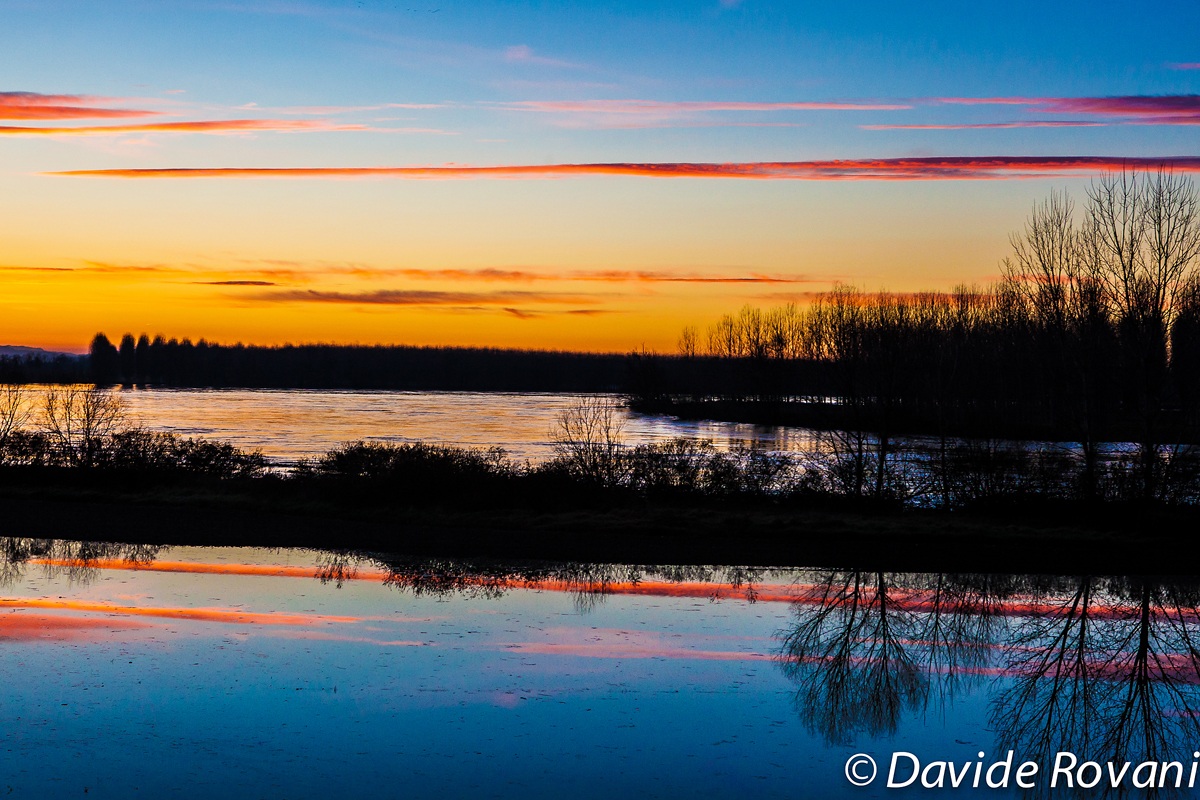 Tramonto sul Po in piena