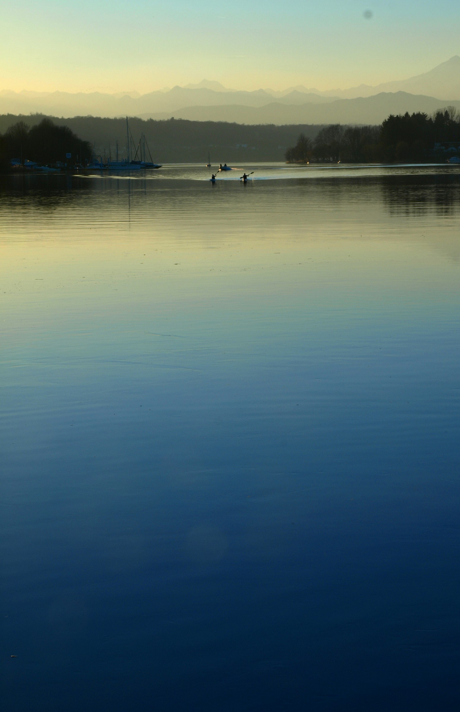 Father and son in the blue water