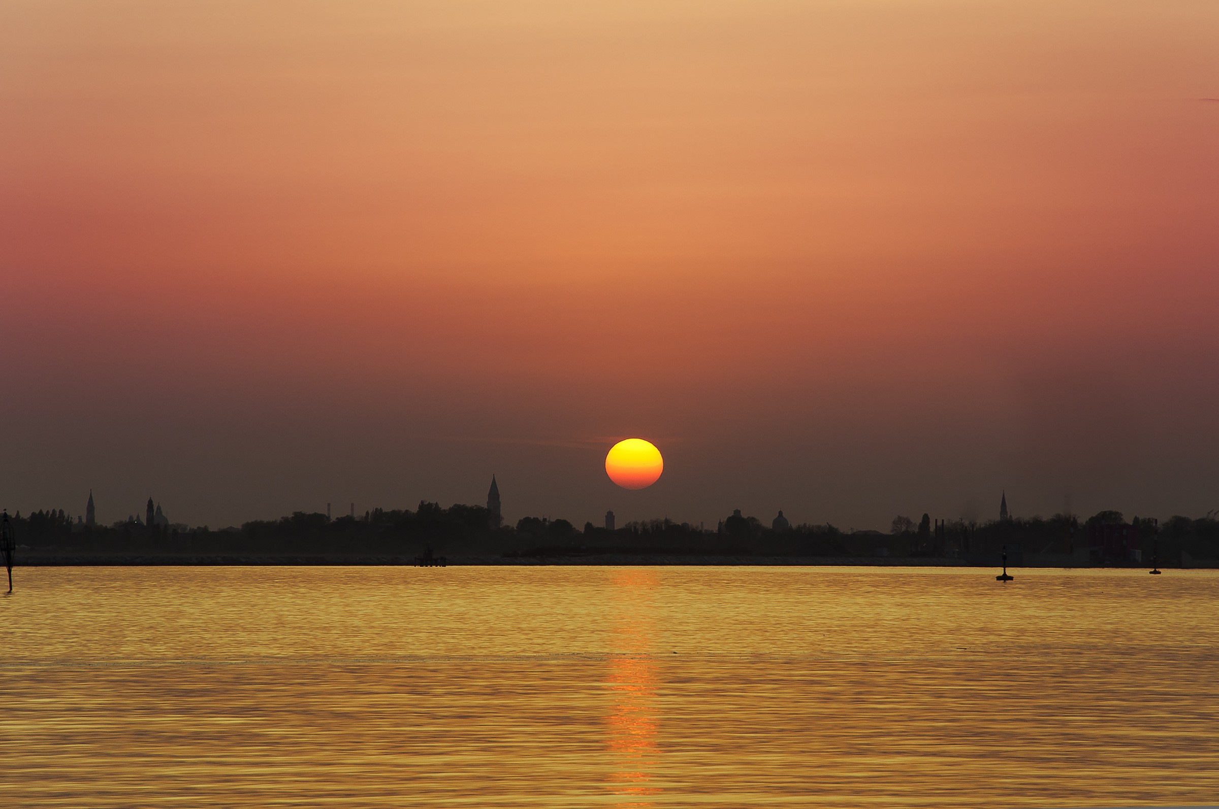 Sunset on the lagoon with a view of San Pietro in Castello