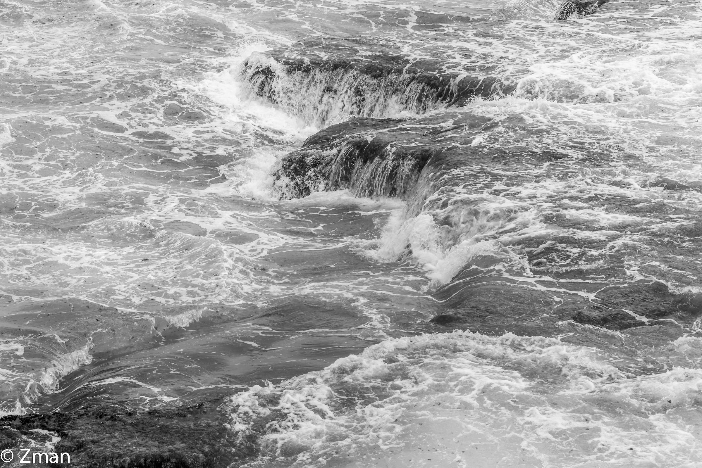 Waves Breaking on The Rocks