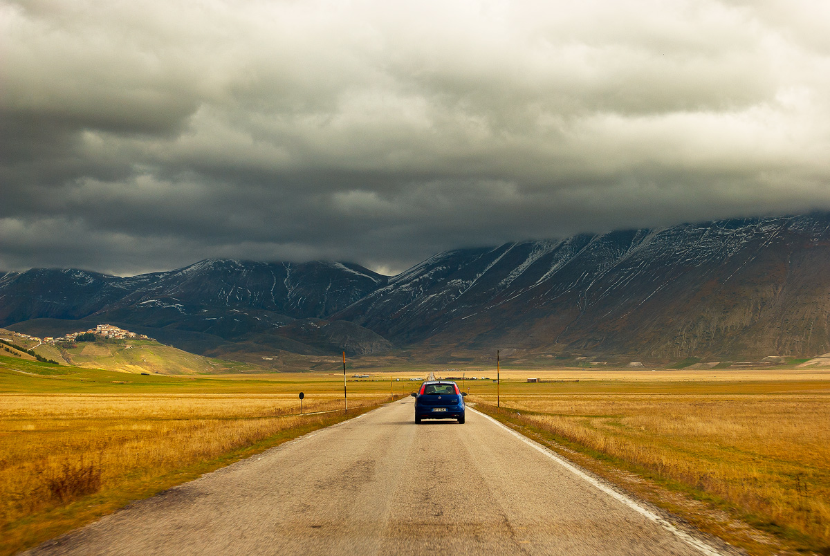 Long and straight ran down the street ...
