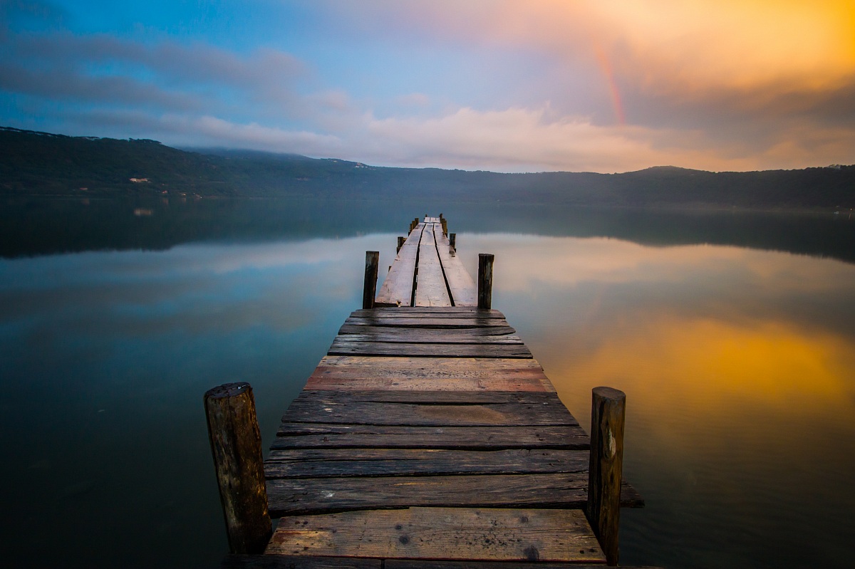 Sunset after the storm with rainbow