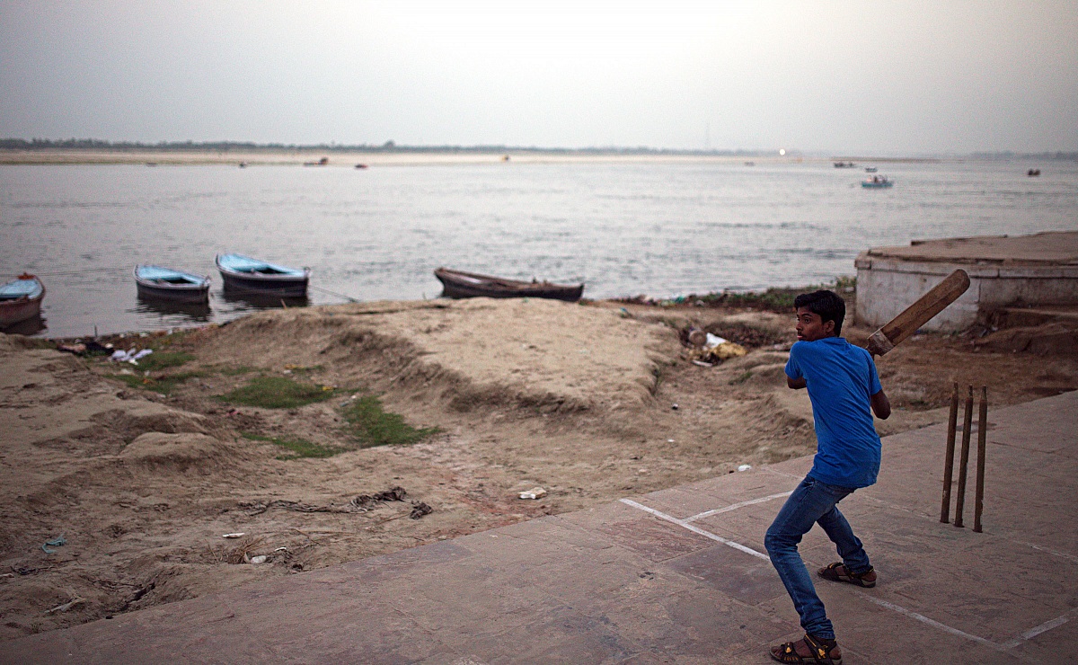 playing cricket along the Ganges