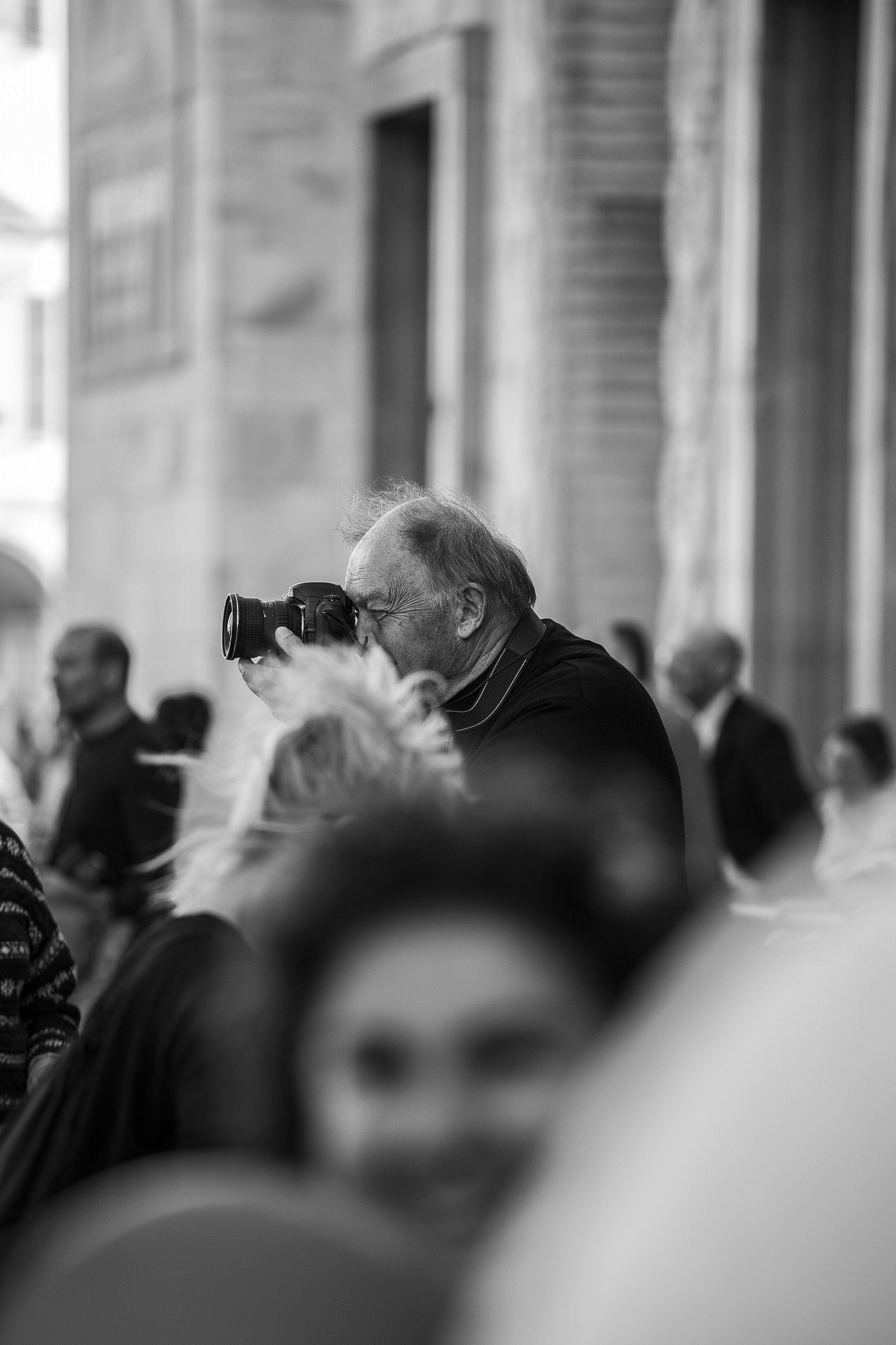 The photographer in the crowd