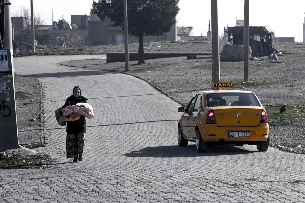 Woman with child (Turkey, January 2014)