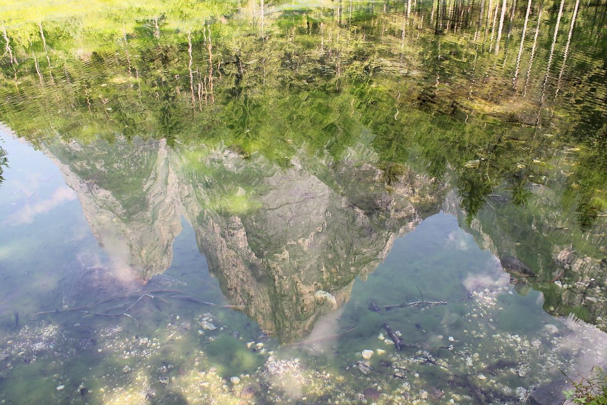 riflesso delle pale di san lucano dolomiti