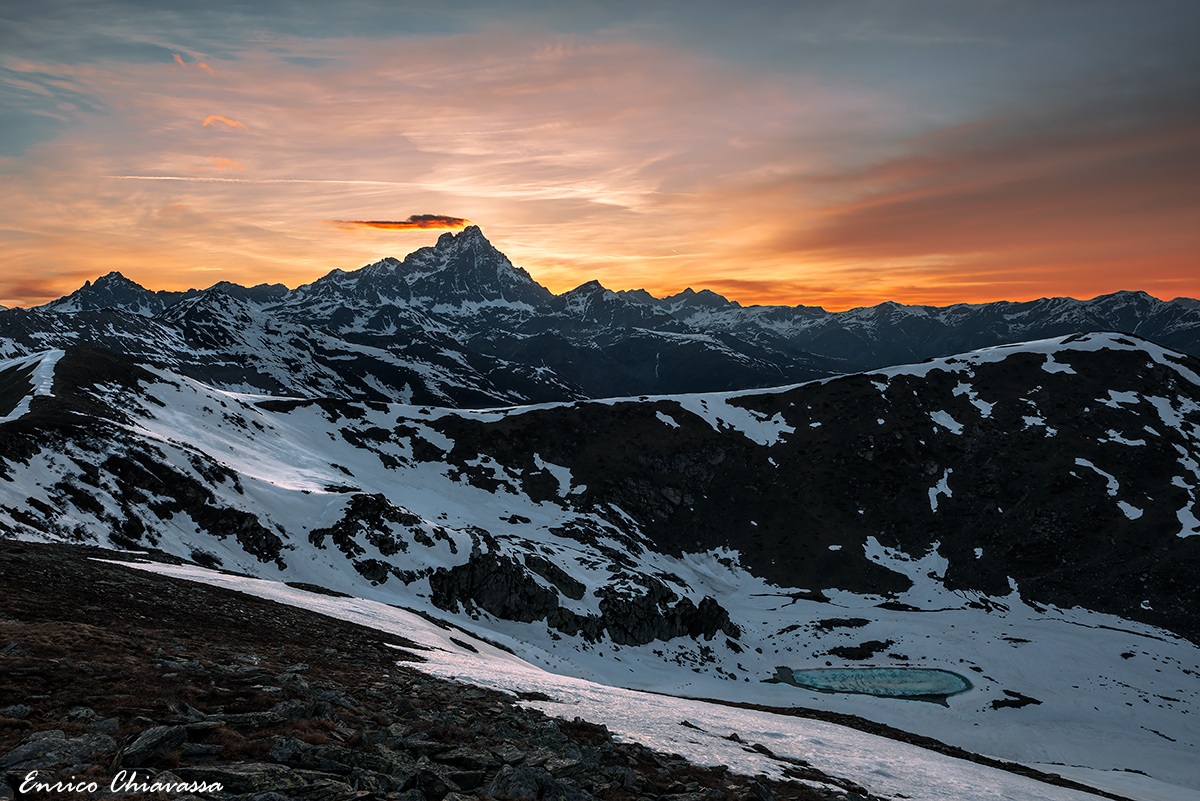Monviso with ephemeral lake at sunset