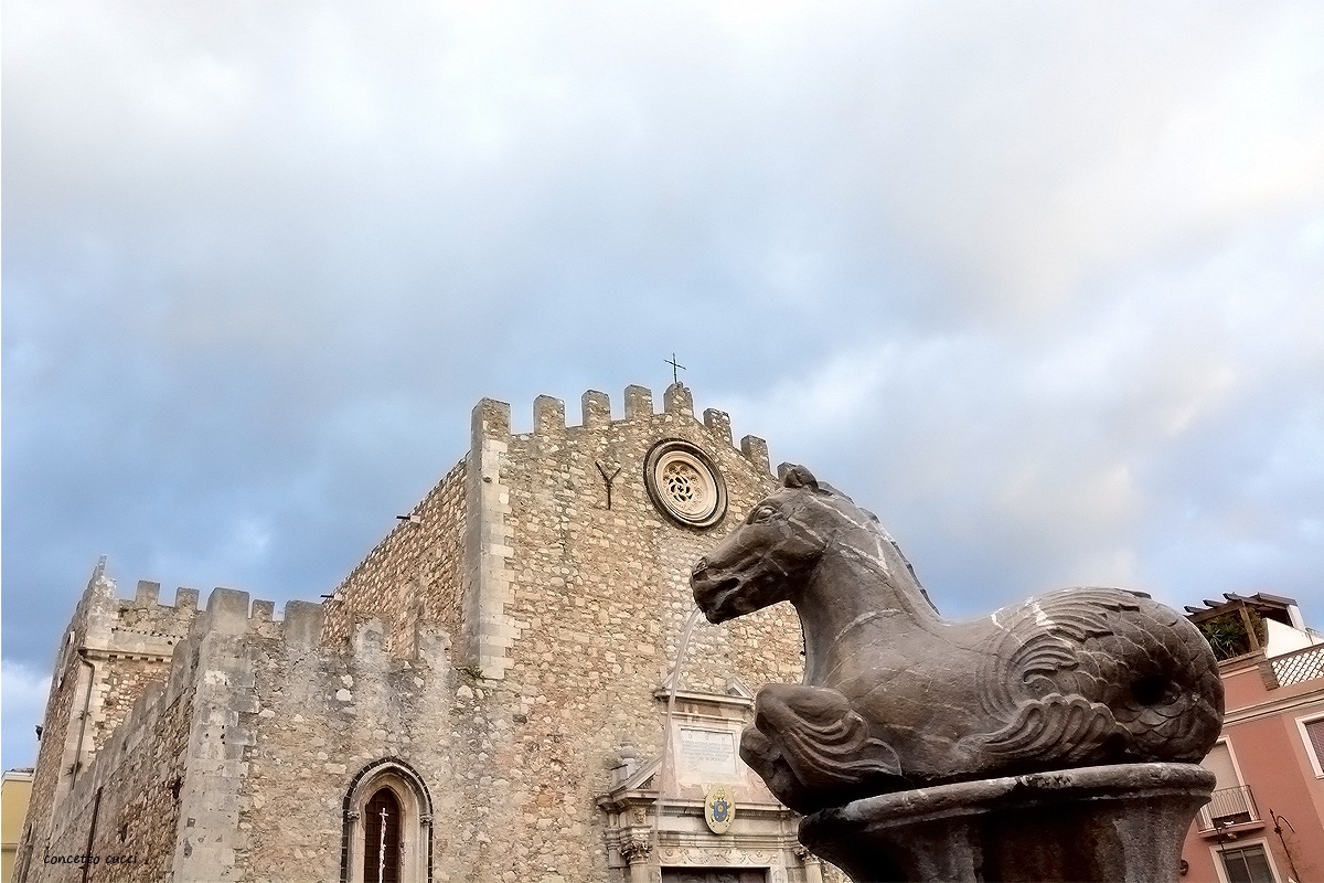 Detail of horse head fountain in Taormina
