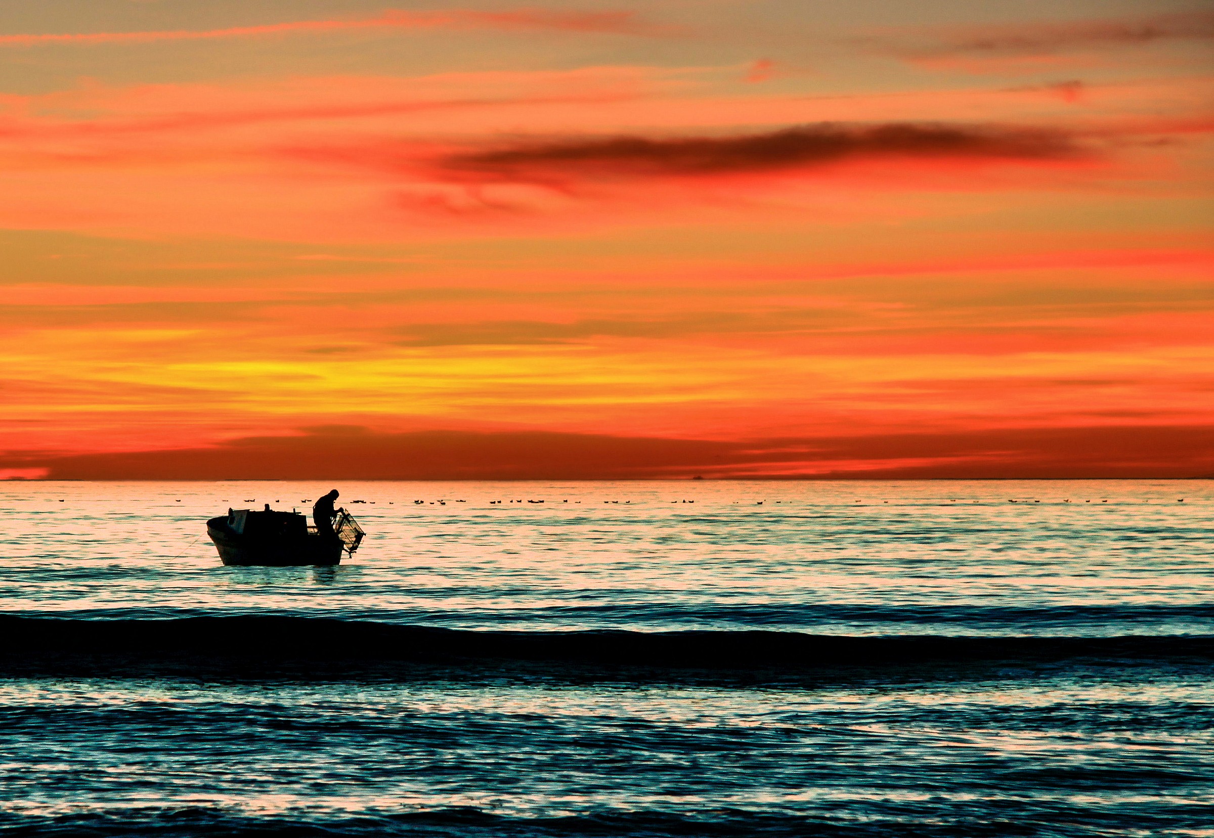 fisherman at sunset