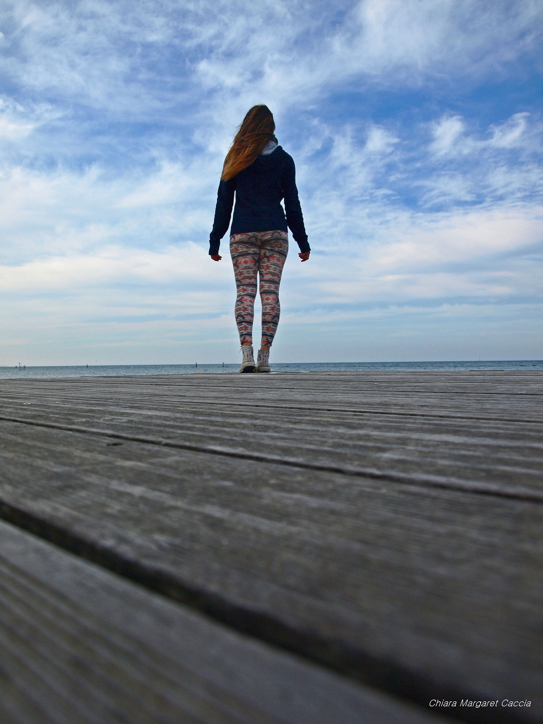 Hiker on the sea front in Cervia