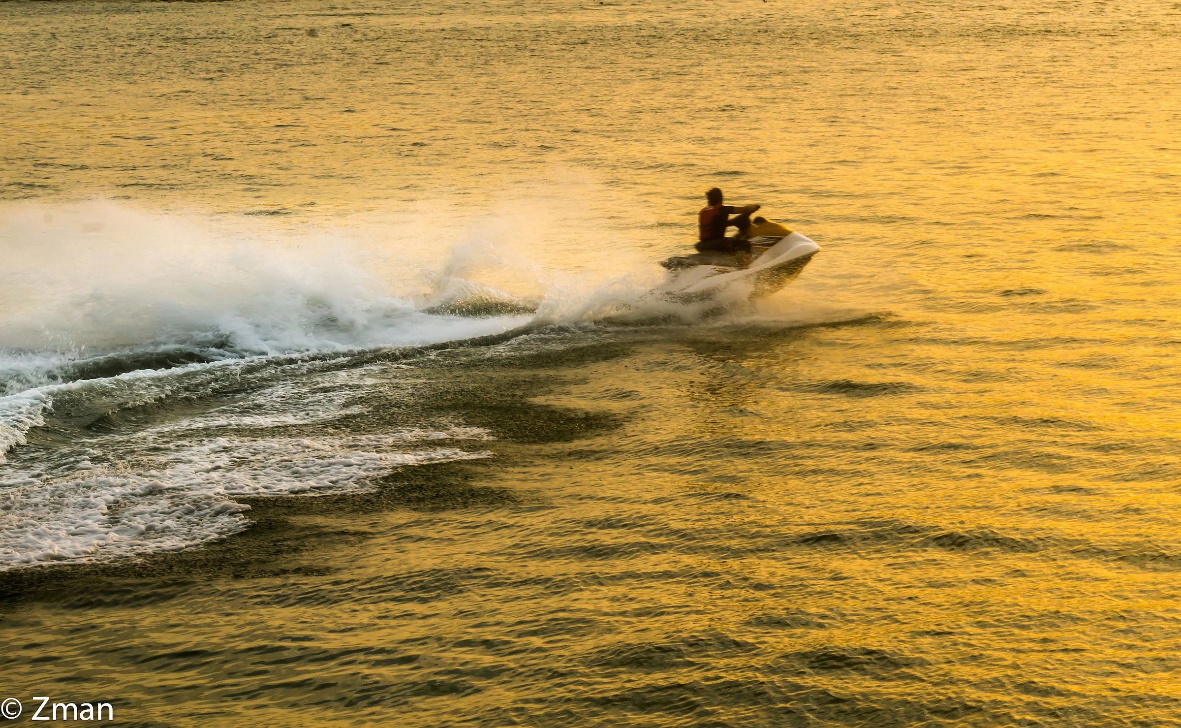 Scooter Racing Into The Sun