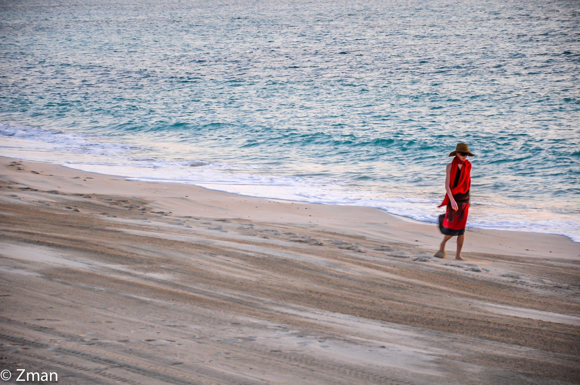 Lonely Beauty Stretching Her Bare Feet on The Beach
