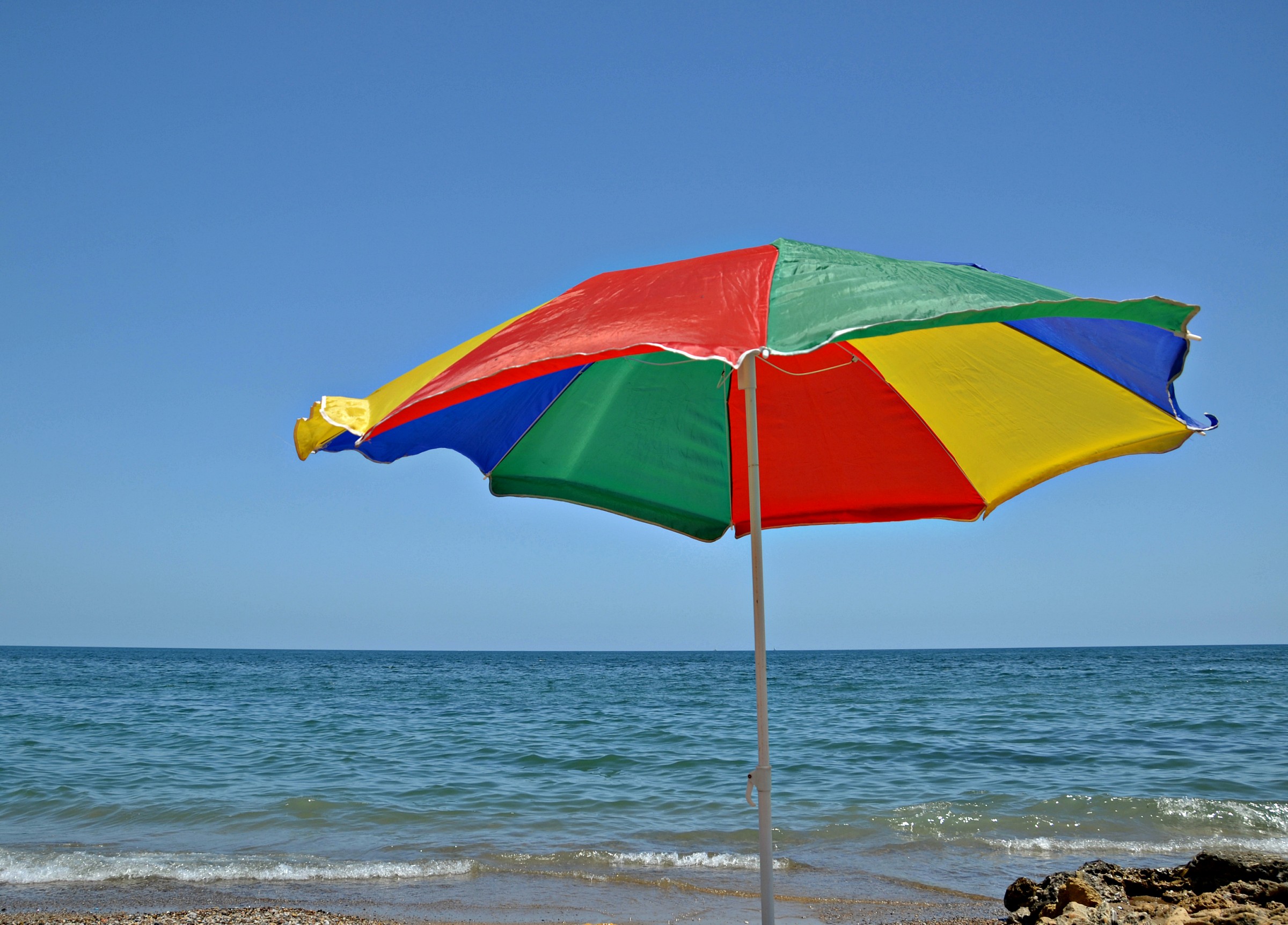 lonely beach umbrella