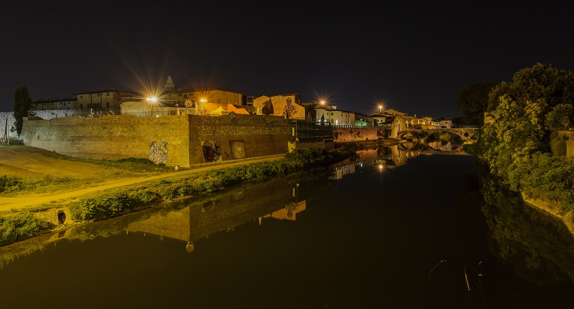 Il fiume Bisenzio e le mura medievali di Prato