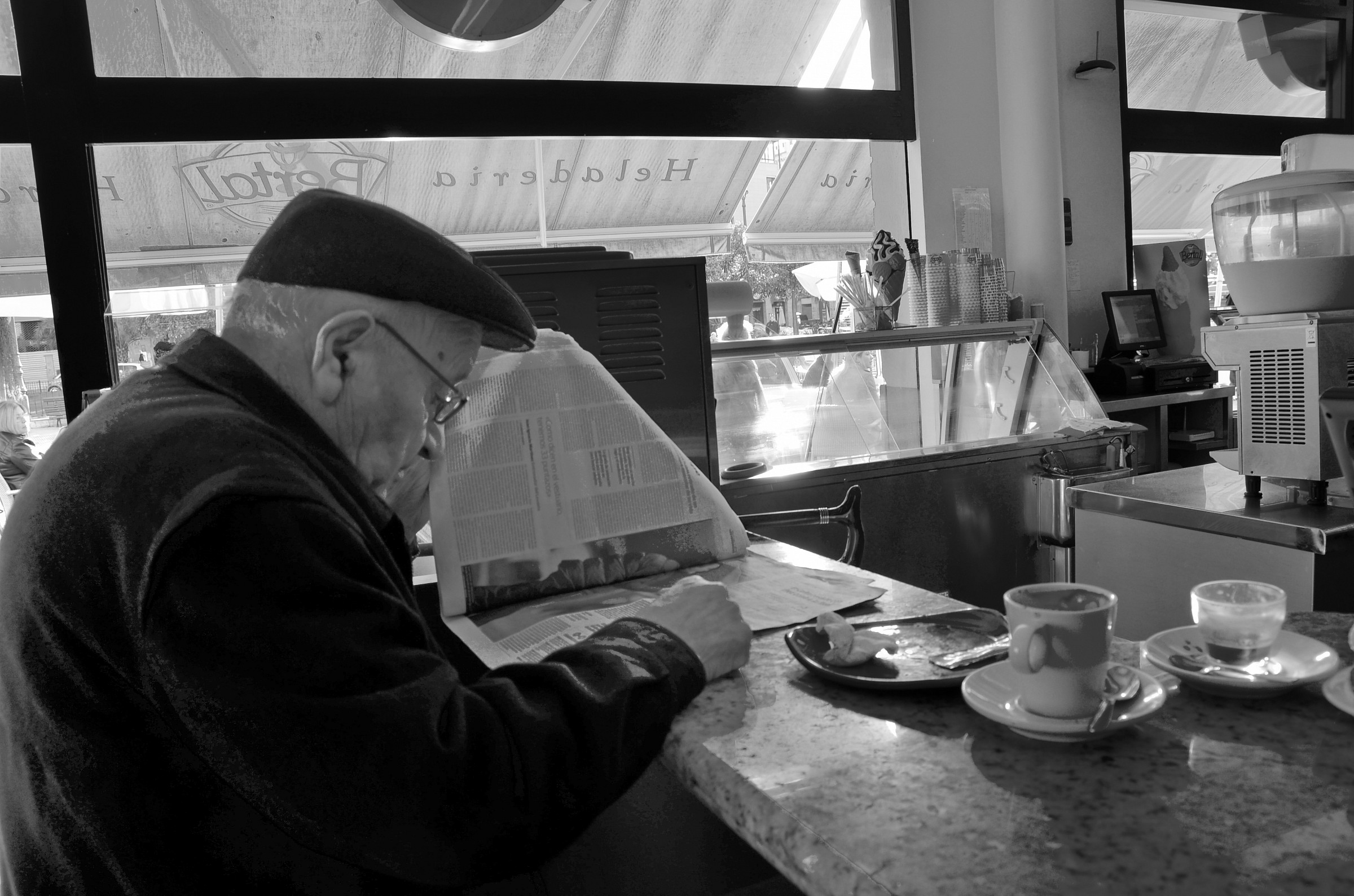 reading the news - Valencia, Spain