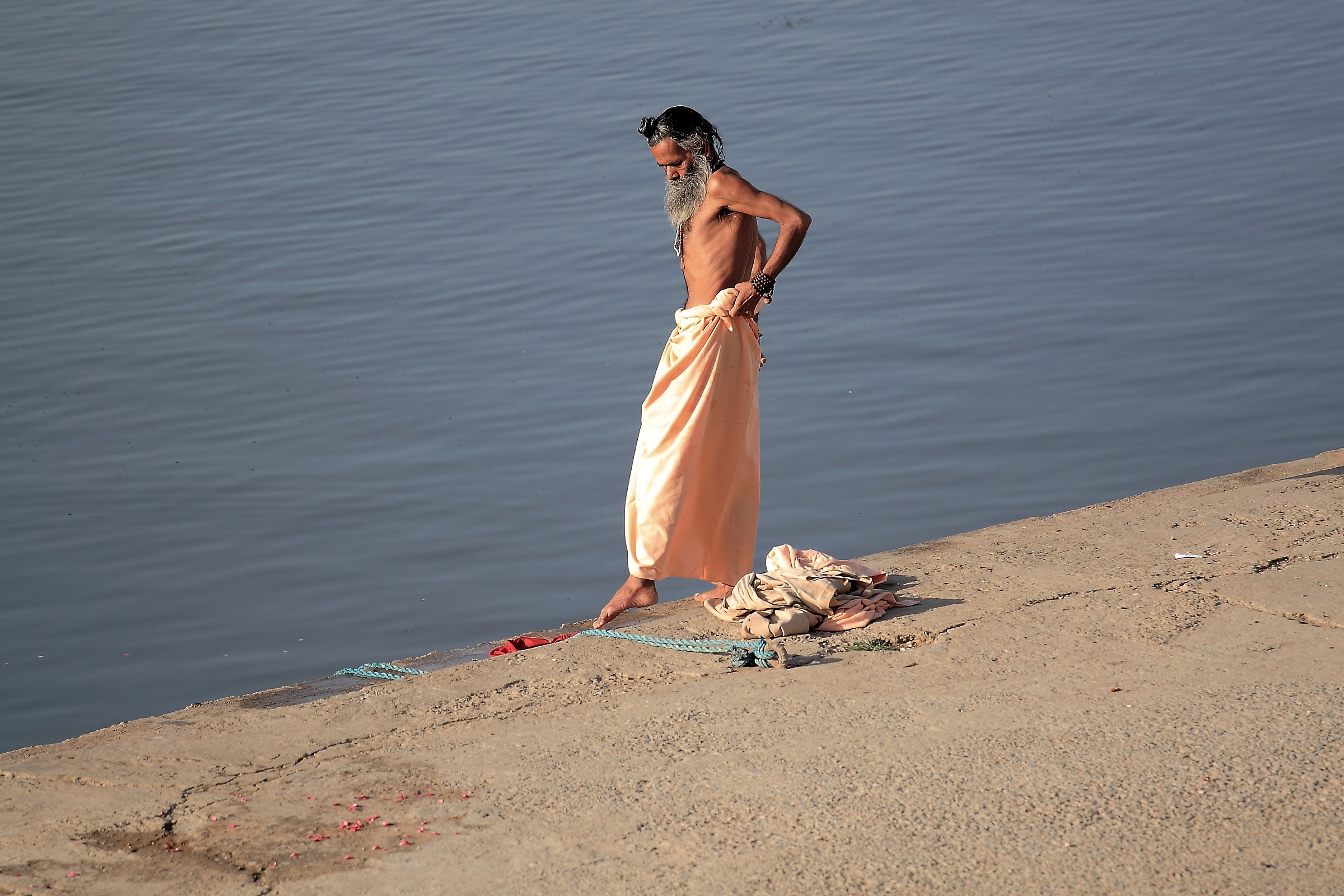 Pushkar, finished his ablutions to Gath