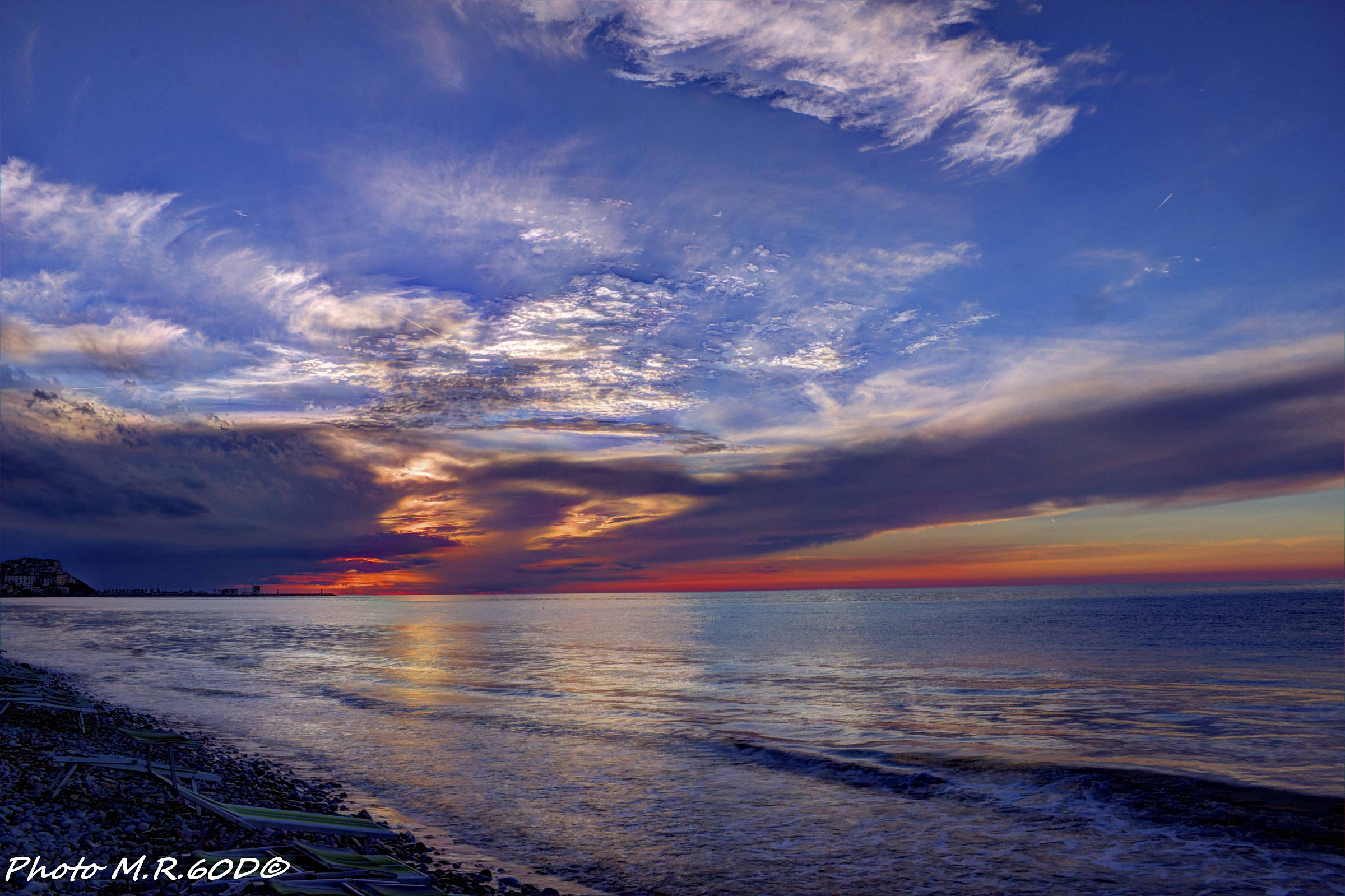 Sunset from the beach at the end of August Gargano and