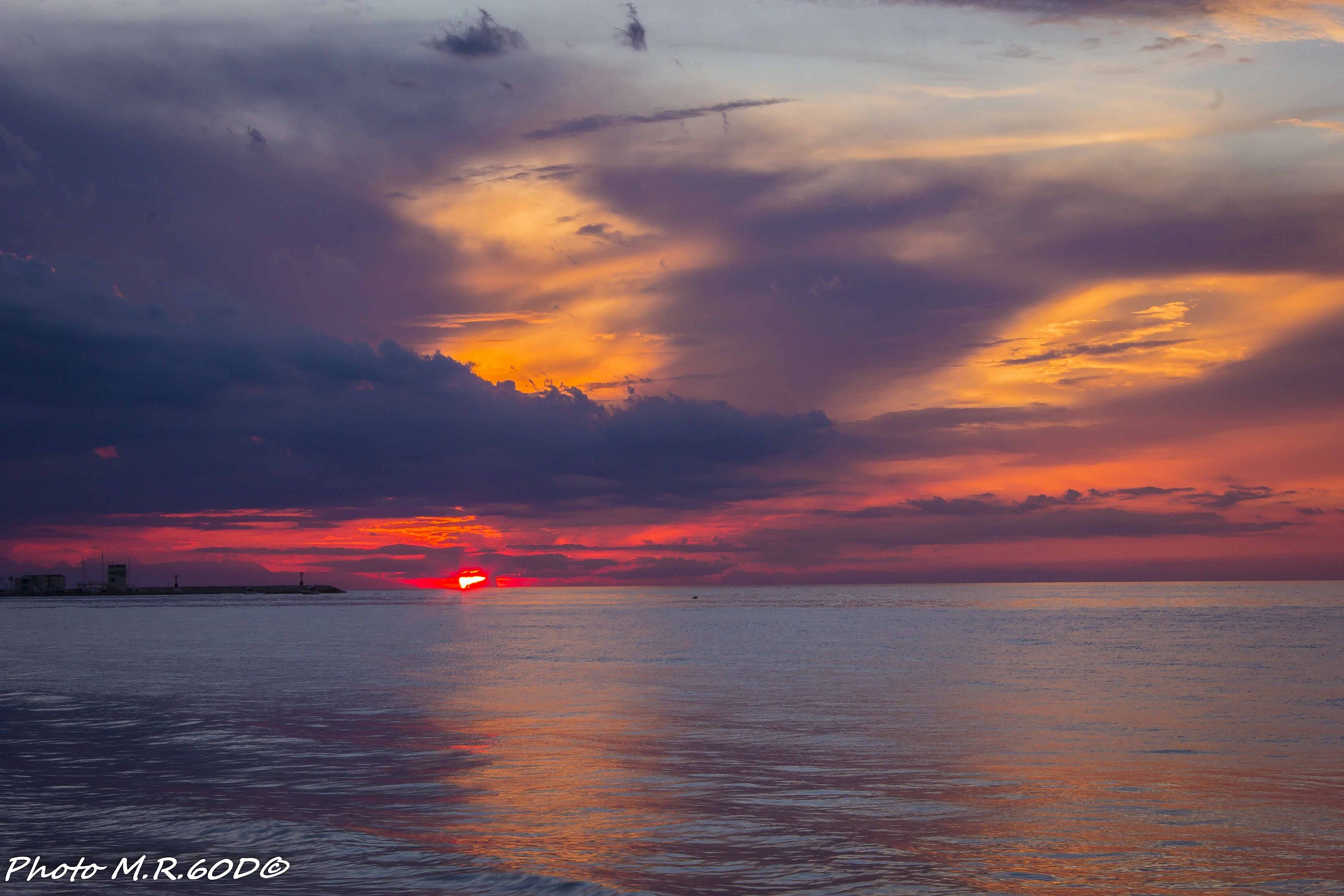Sunset from the beach at the end of August Gargano and