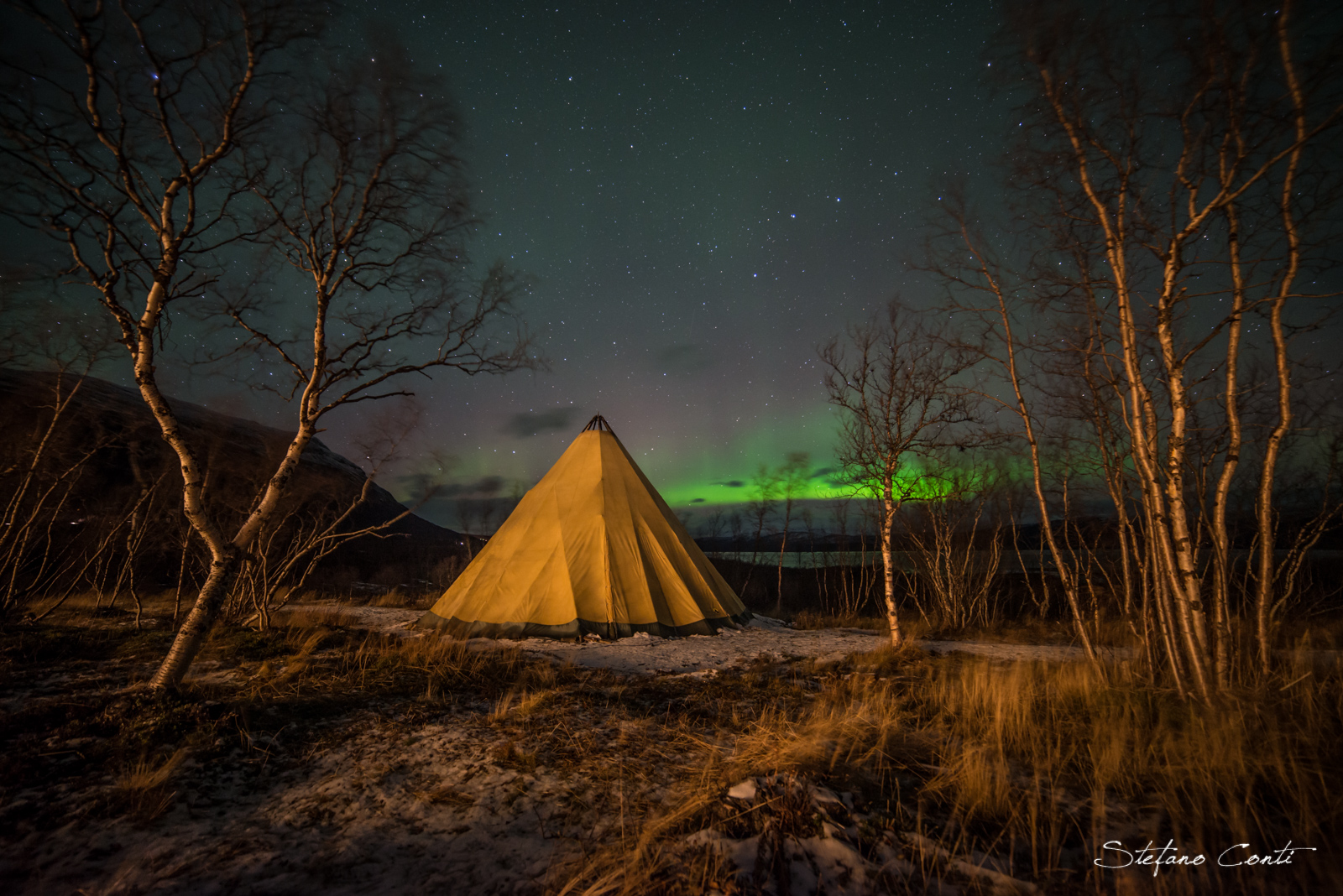 Sami tent by the light of the aurora borealis