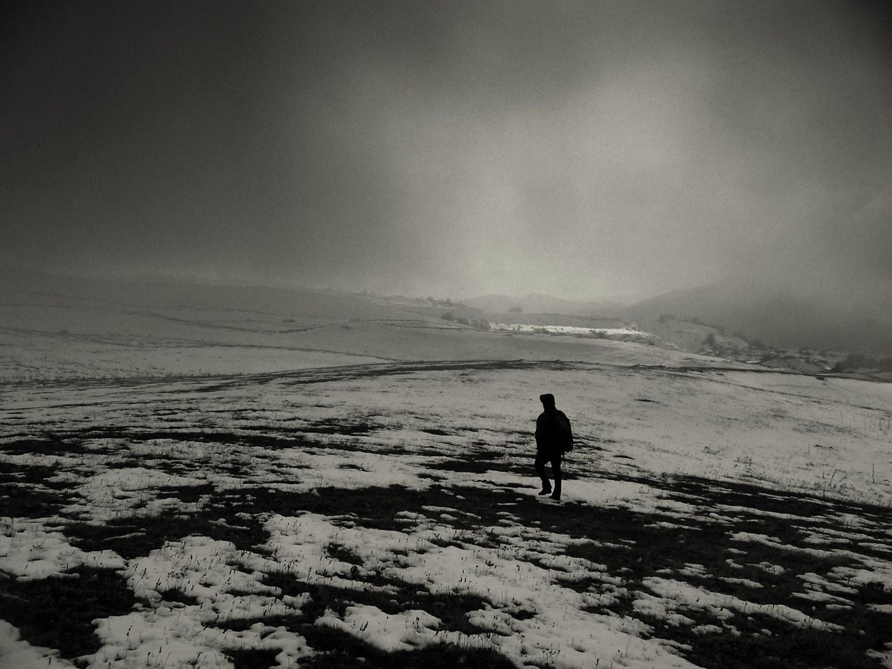 Shadow of man in the snow