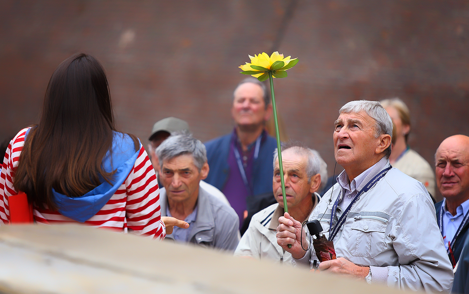 The man with the flower in her hand