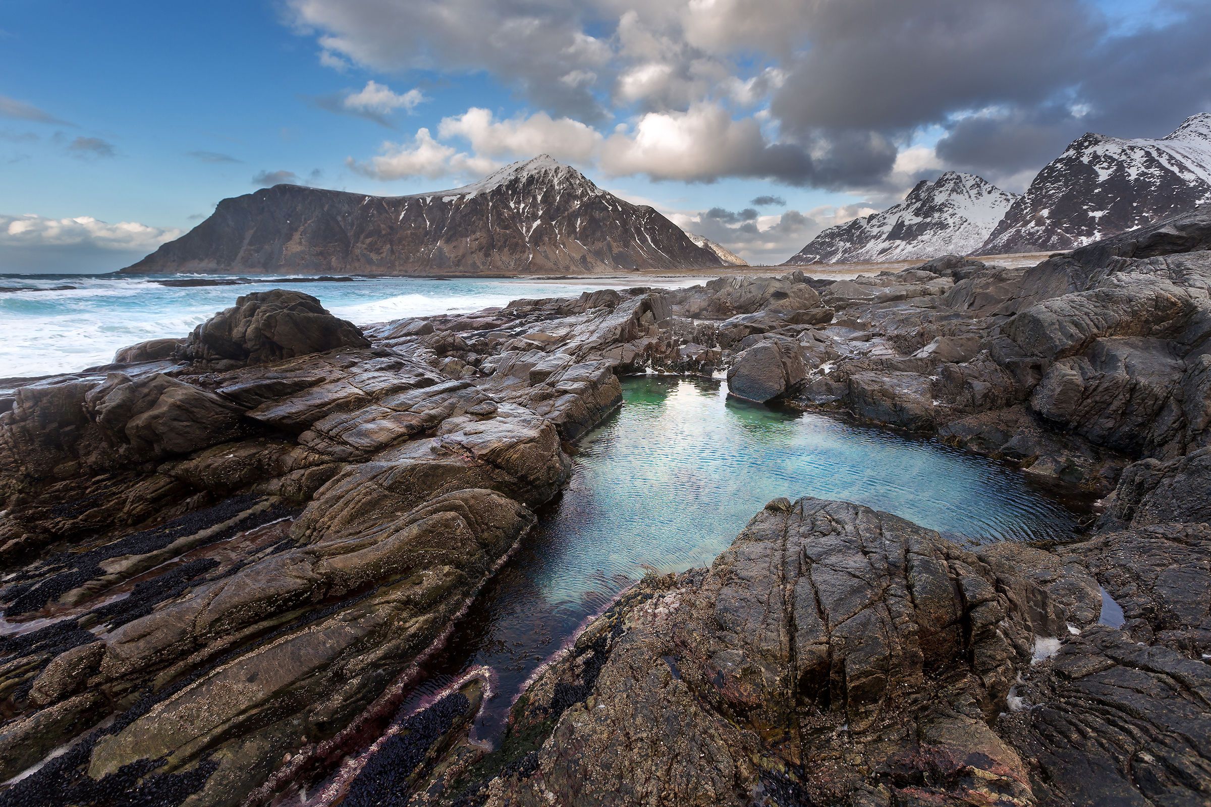 Games of water and rock in the beautiful bay of Skagsanden