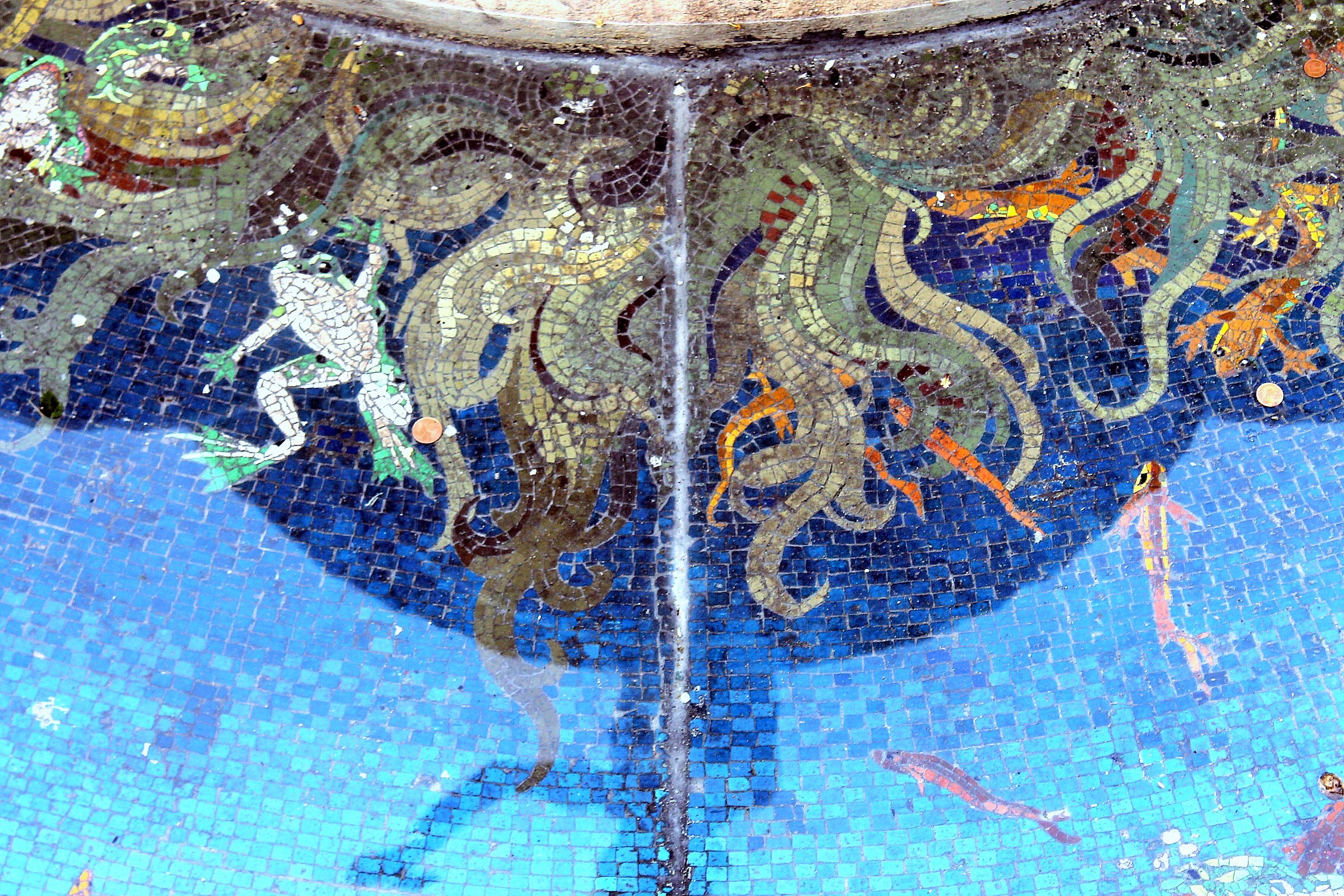 In the bottom of the fountain