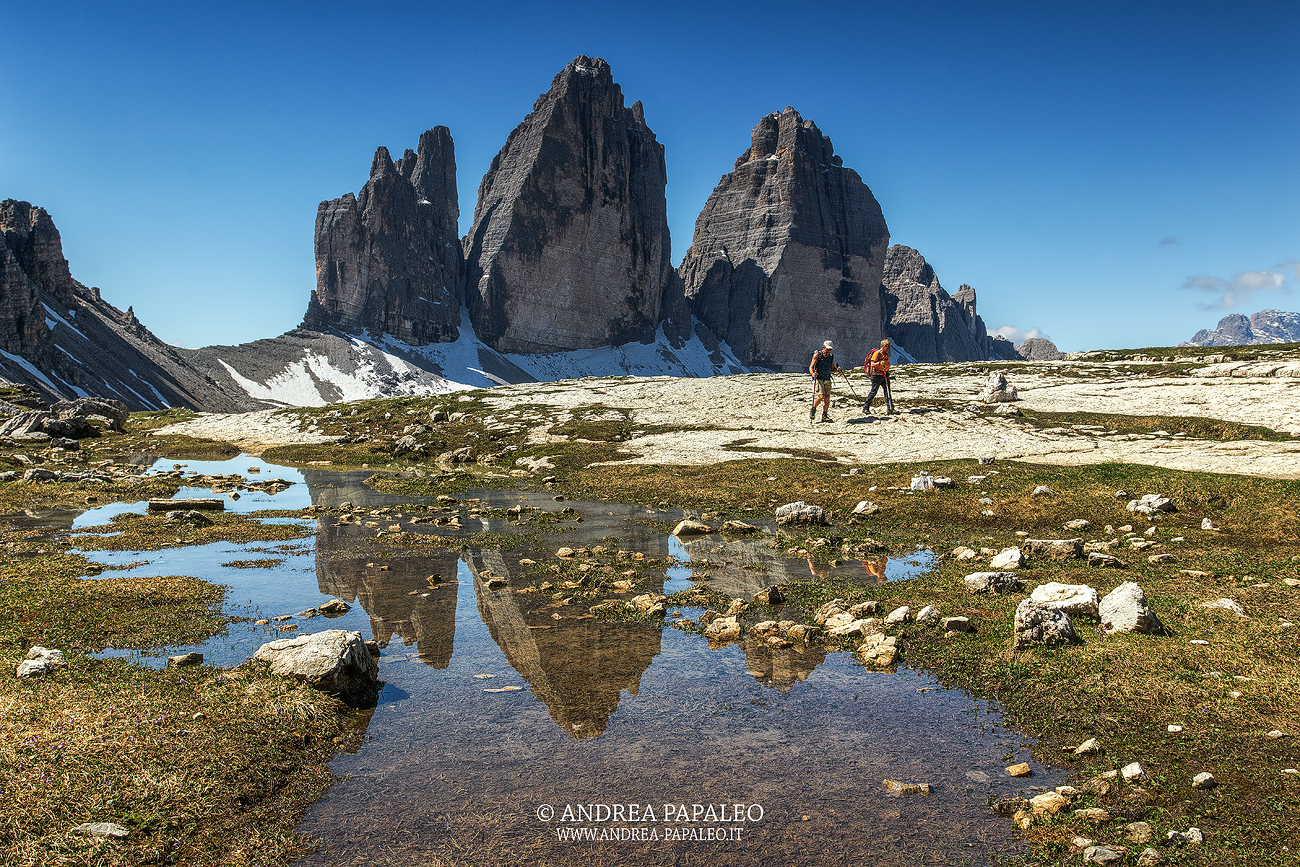 Hikers and the Three Peaks of Lavaredo